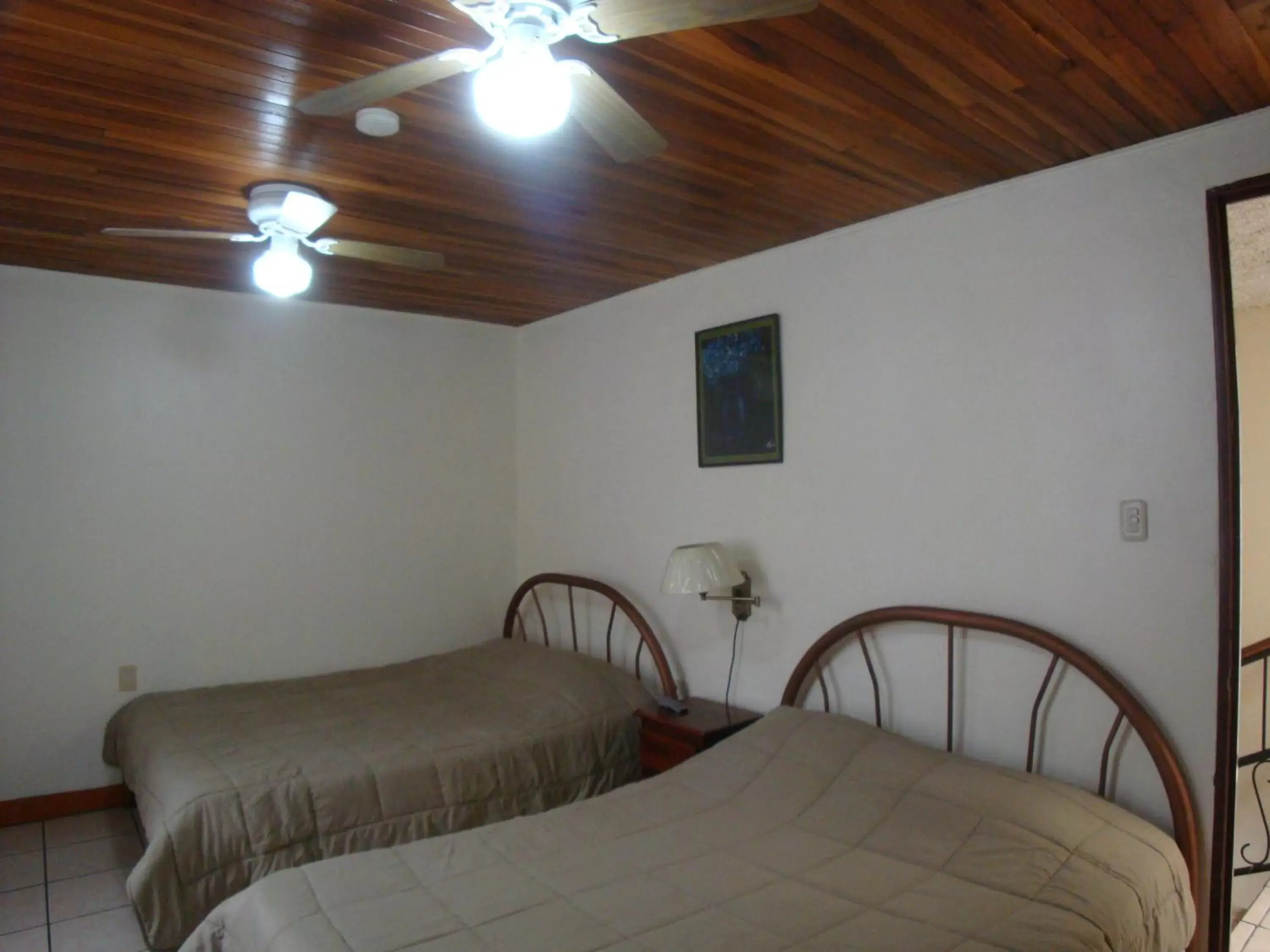 Bedroom, Bed in Hotel La Guaria Inn & Suites