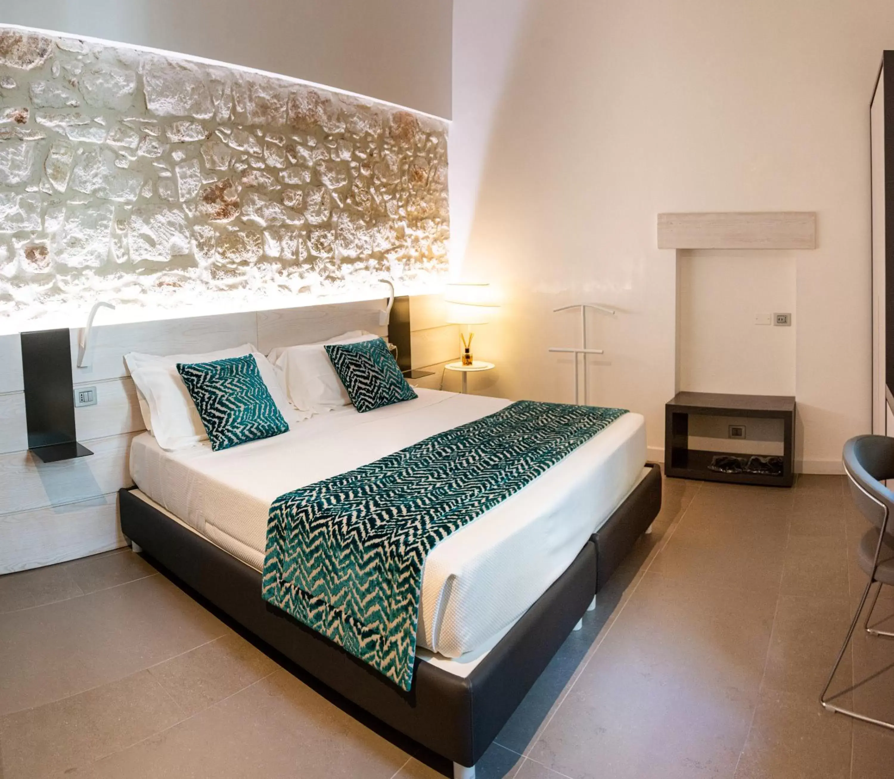 Bed in Caportigia Boutique Hotel