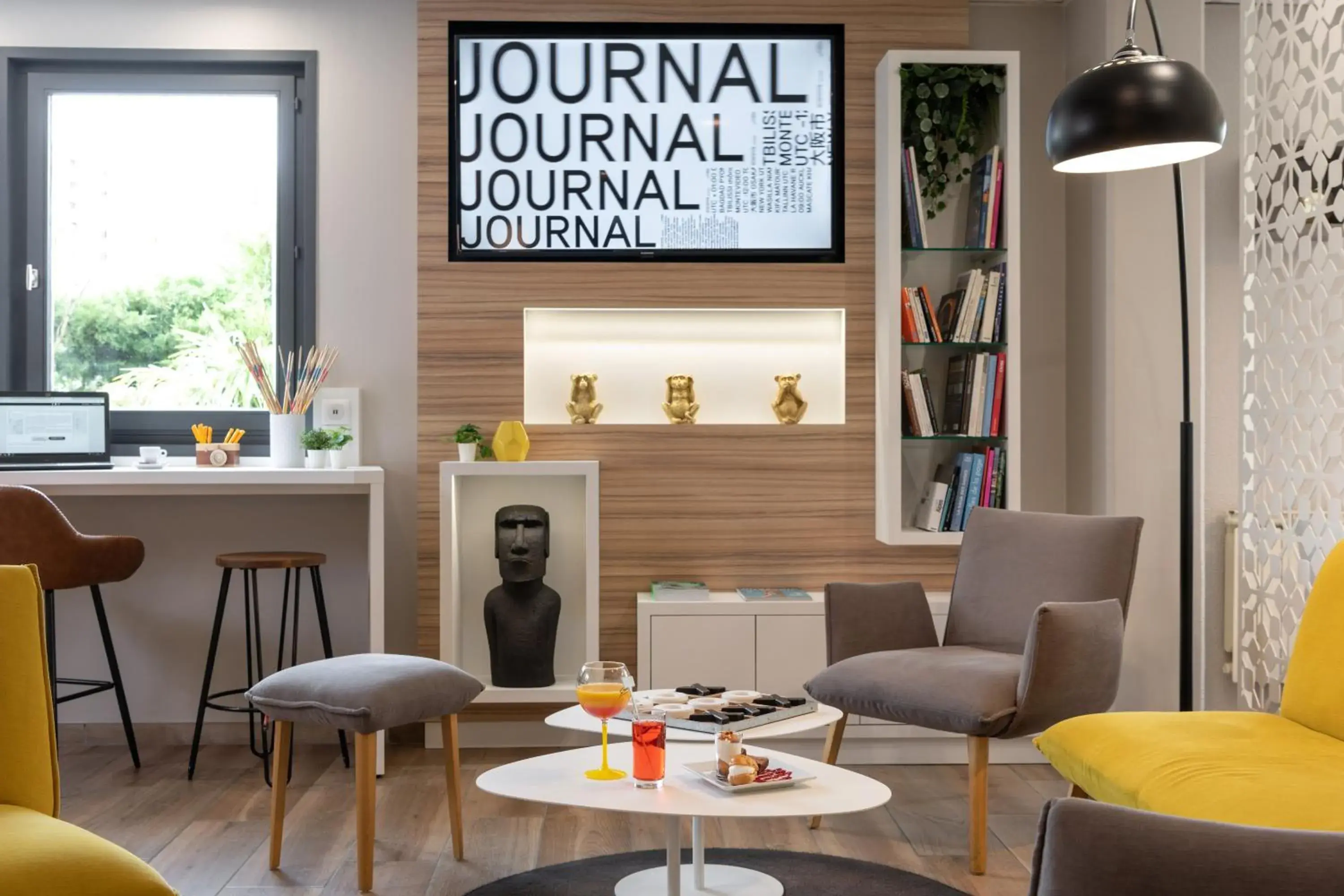 Communal lounge/ TV room in Kyriad Saint-Etienne Centre