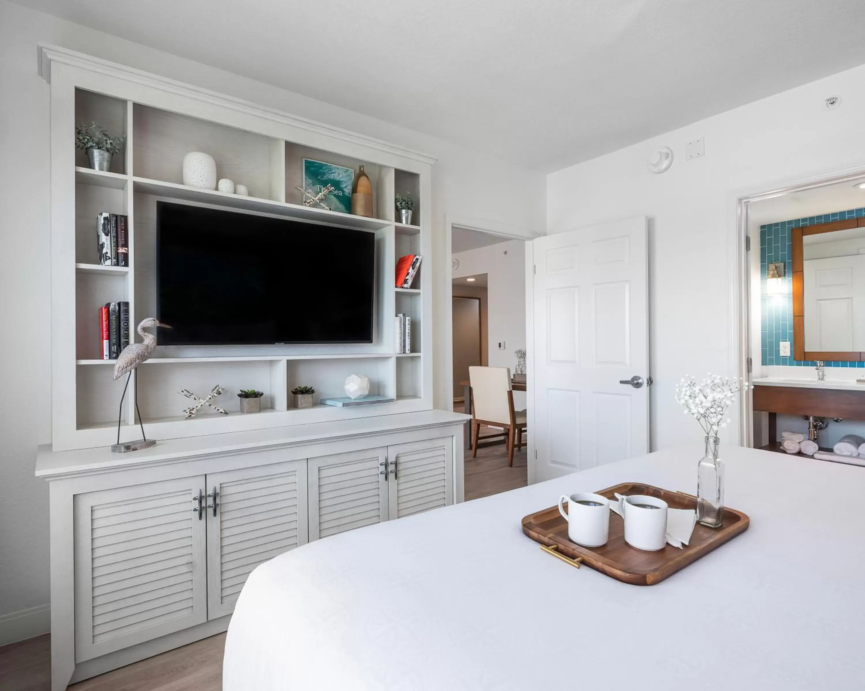 Bed, TV/Entertainment Center in Compass Hotel by Margaritaville Anna Maria Sound