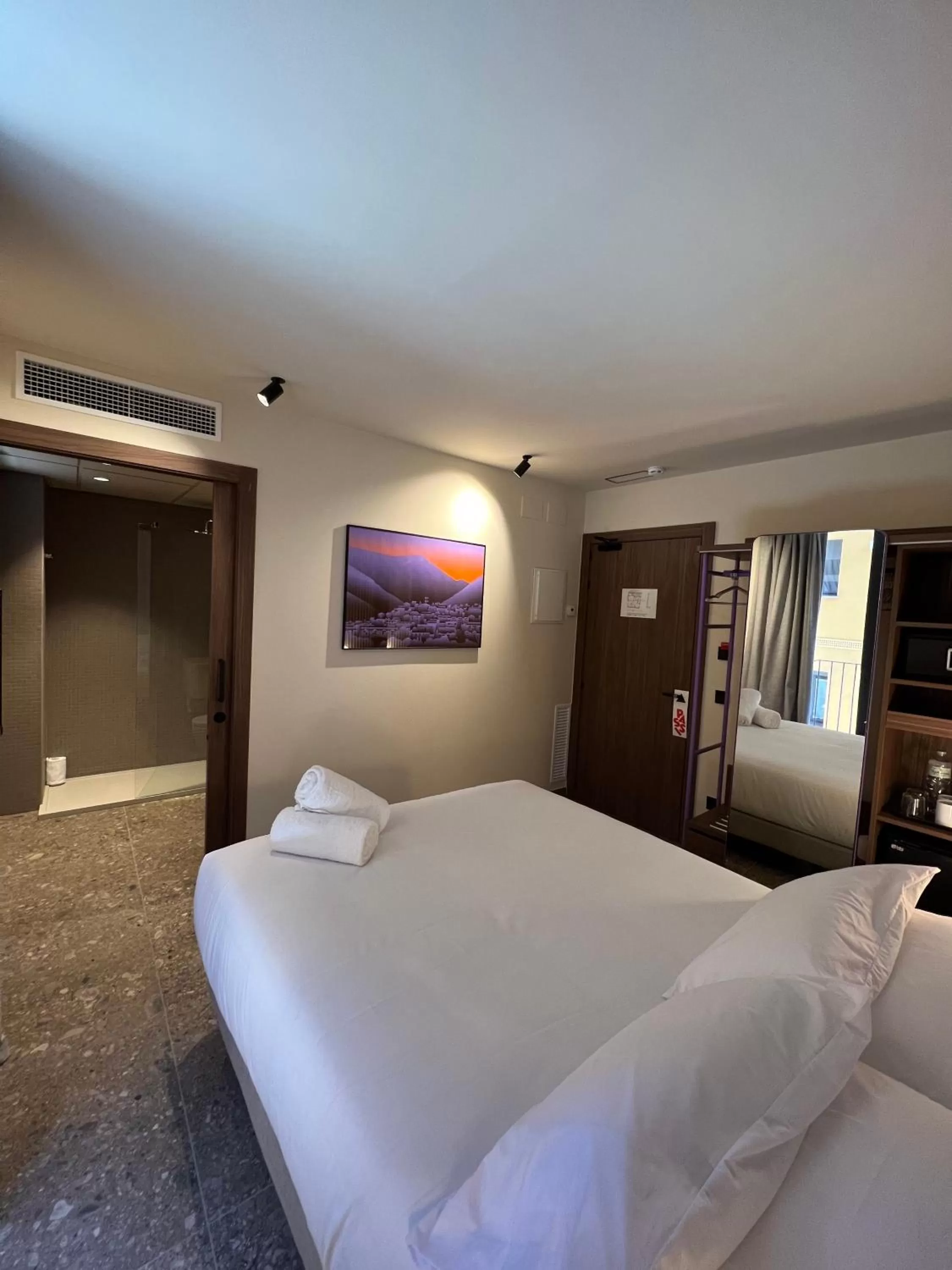 Bed in CIM HOTEL BOUTIQUE