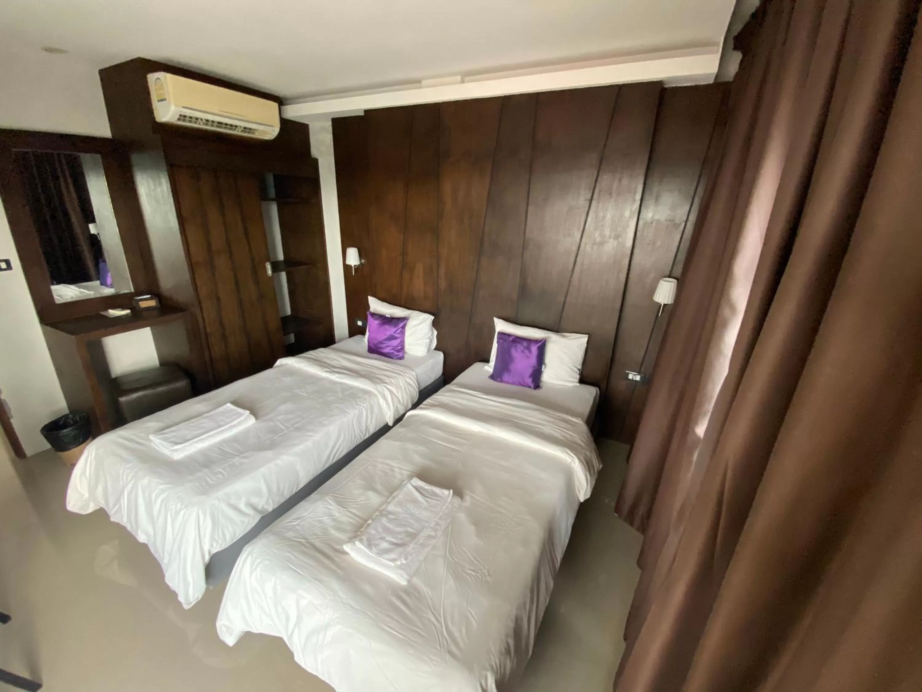 Bed in Rakkawan Residence
