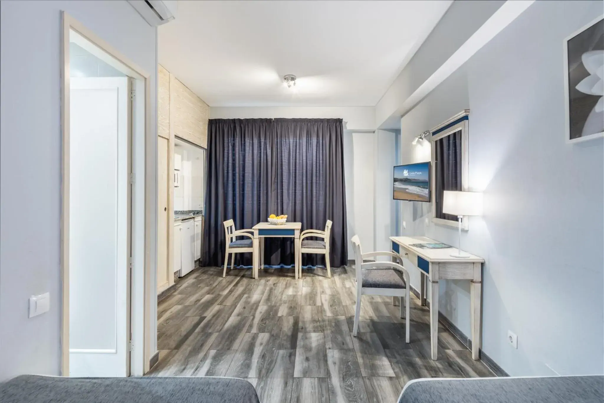 Photo of the whole room in Apartamentos Colón Playa Photo of the whole room in Apartamentos Colón Playa