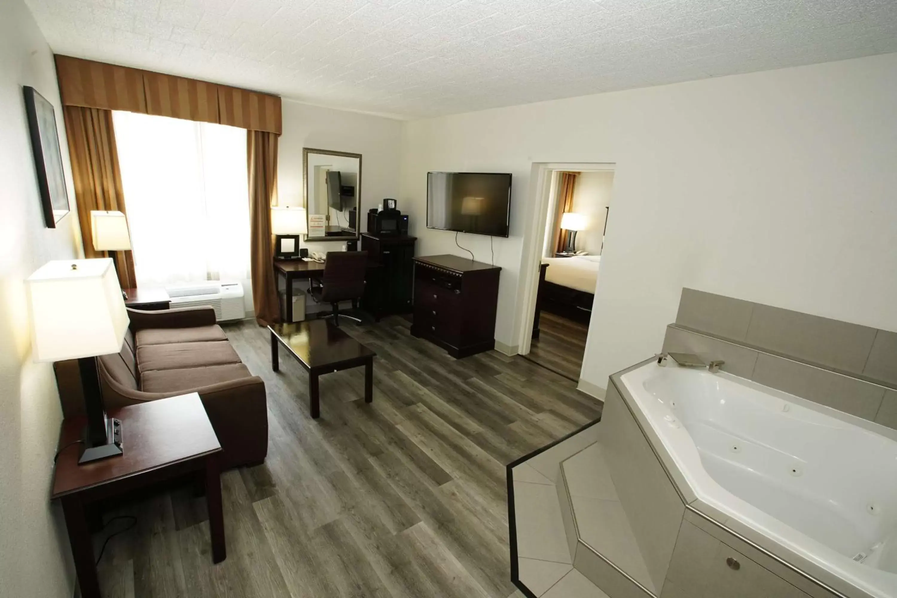 Photo of the whole room, TV/Entertainment Center in Best Western Paramus Hotel & Suites