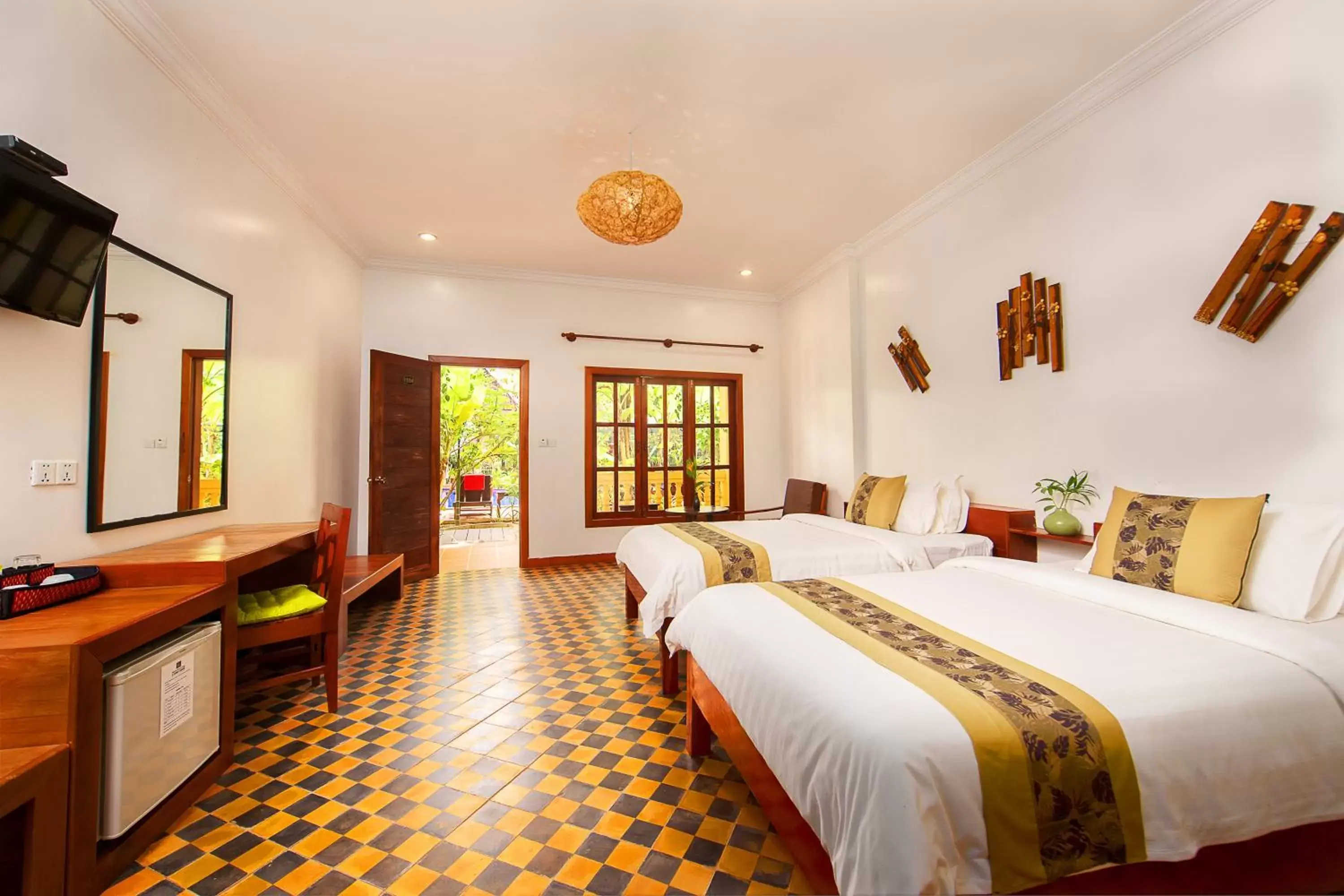 Bedroom in Le Jardin d'Angkor Hotel & Resort