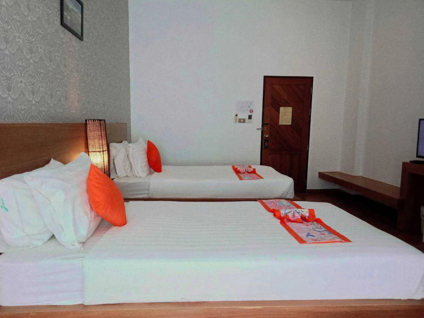 Bed in Jingjit Hotel