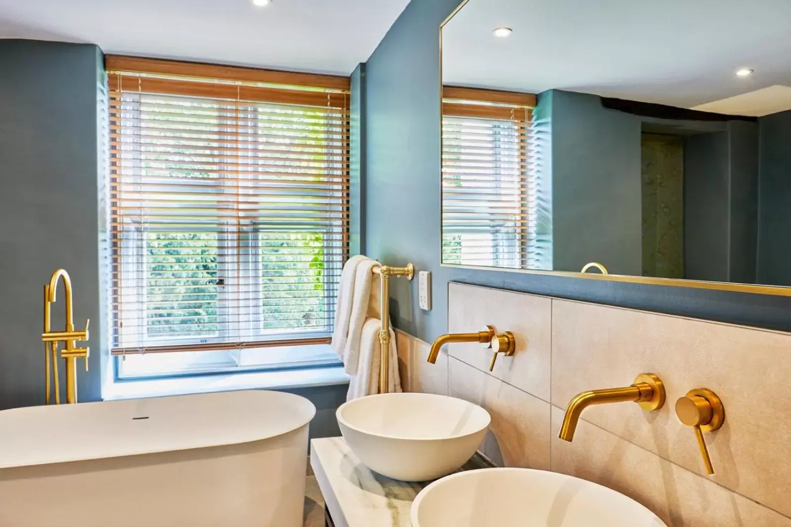 Bathroom in Ockenden Manor Hotel & Spa