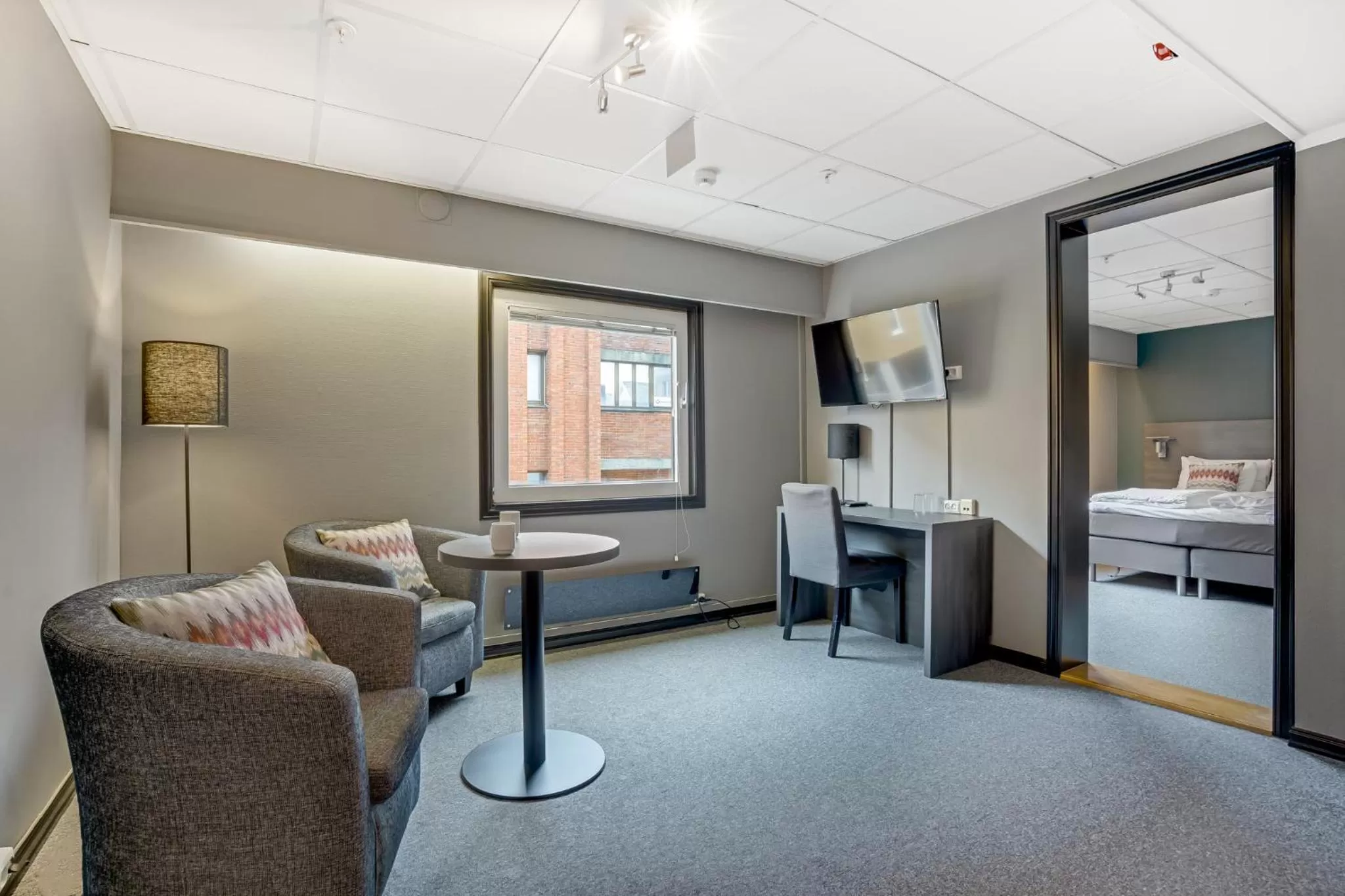 Living room, Bed in Hotel Haugesund