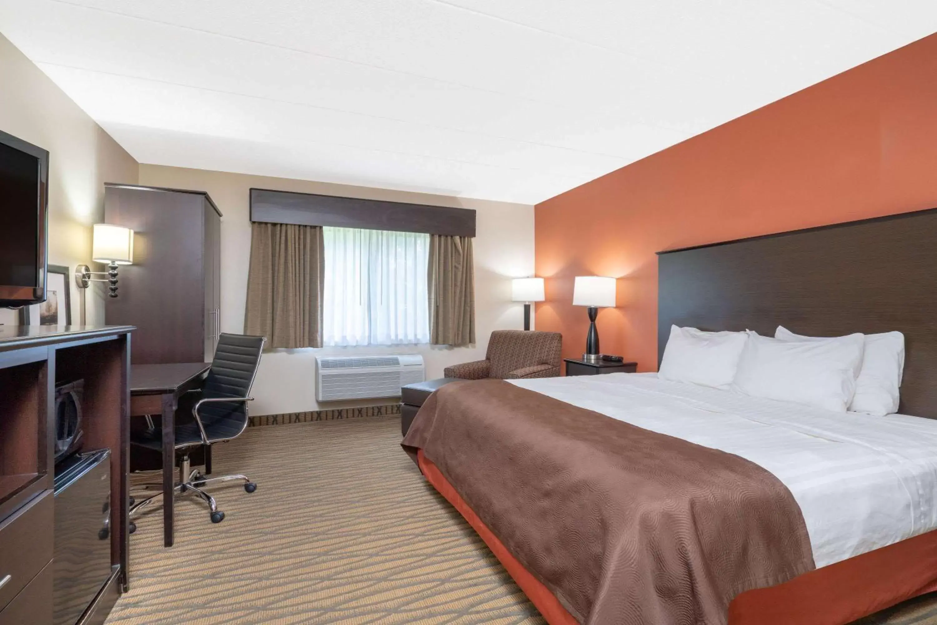 Photo of the whole room, Bed in AmericInn by Wyndham Rogers