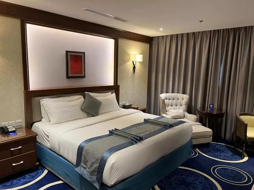 Living room, Bed in Swiss In Tabuk Hotel Living room, Bed in Swiss In Tabuk Hotel