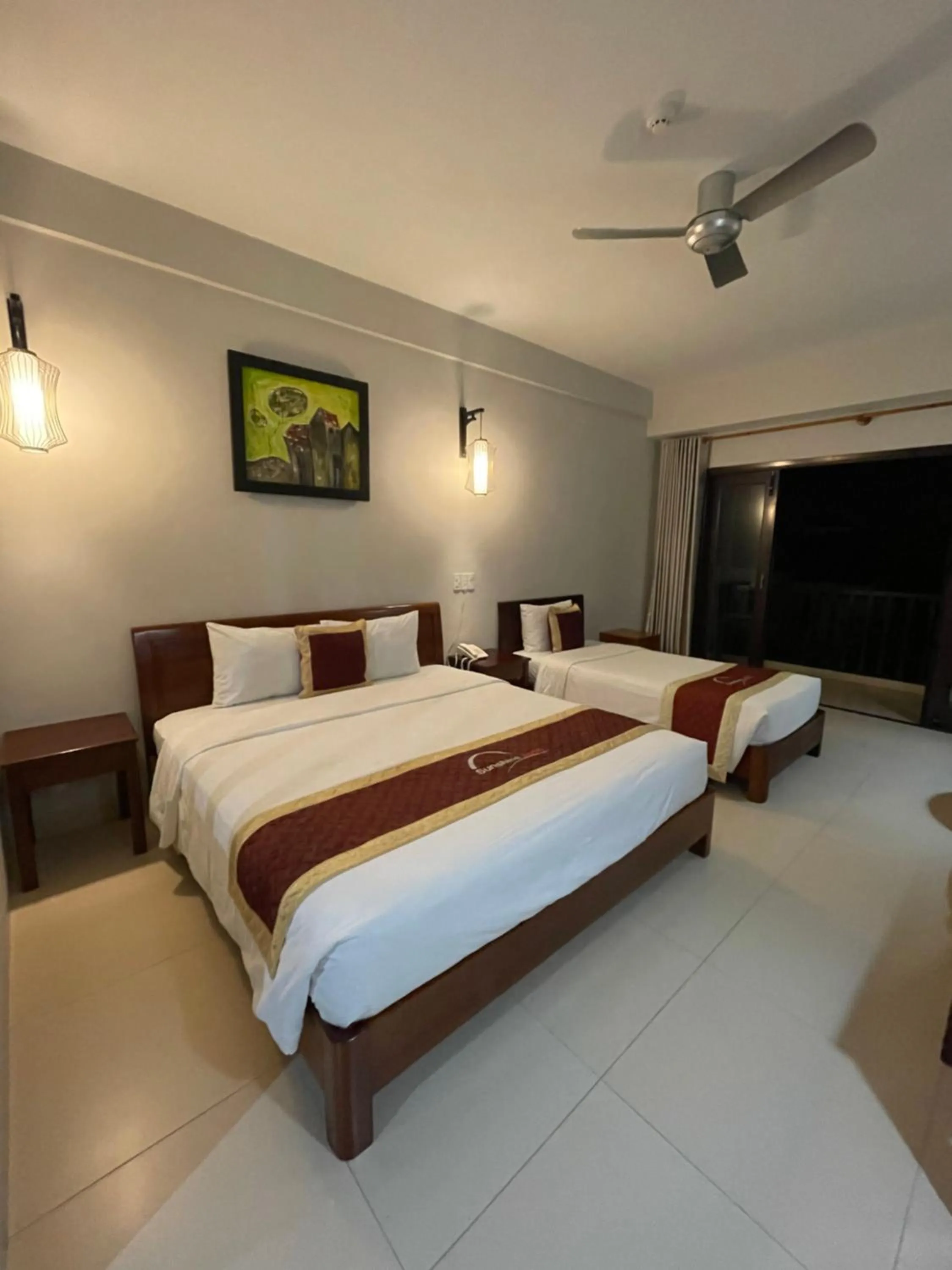 Bed in Sunshine Hoian Hotel