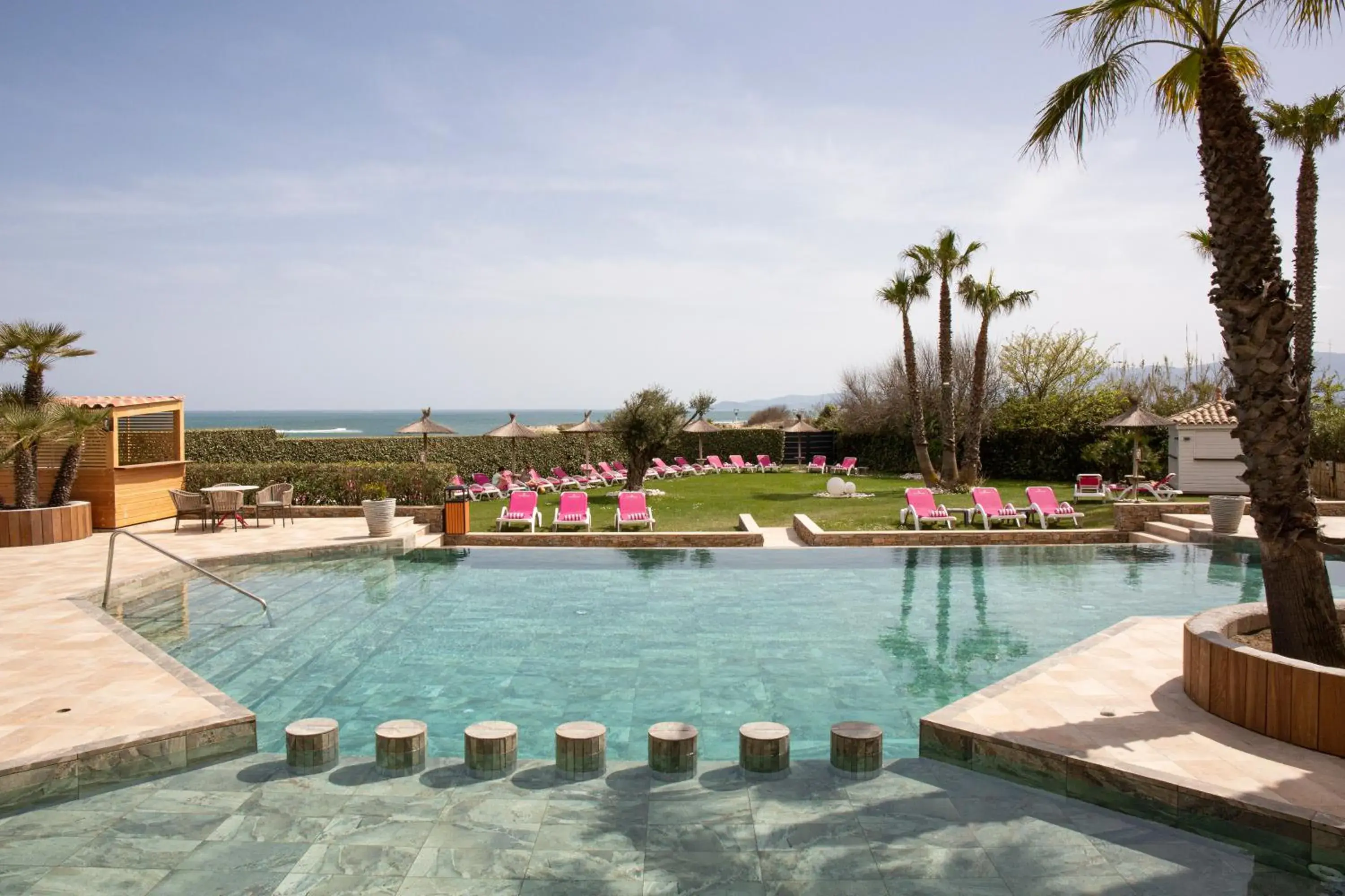 Swimming Pool in Grand Hôtel Les Flamants Roses Thalasso & Spa