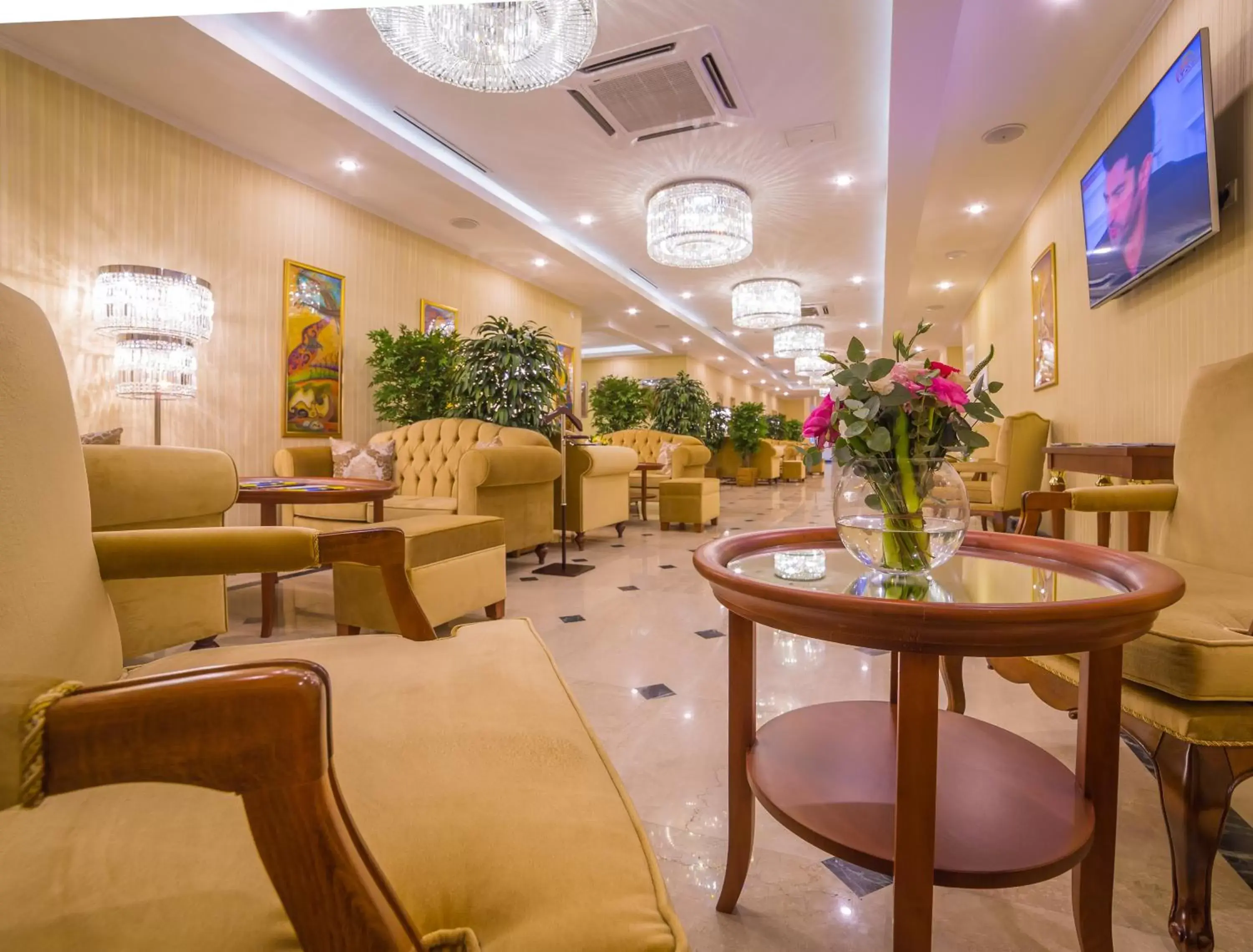 Lobby or reception in Ramada by Wyndham Almaty Lobby or reception in Ramada by Wyndham Almaty