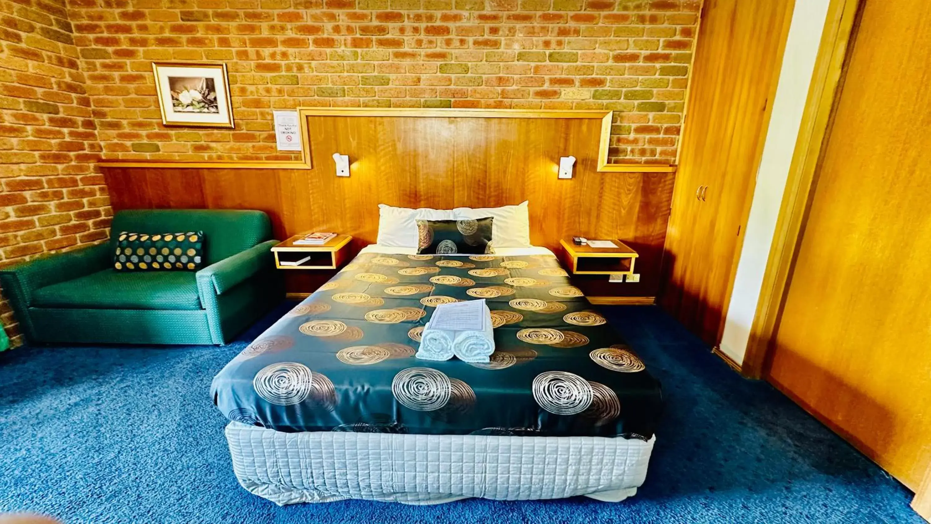 Bed in Early Australian Motor Inn