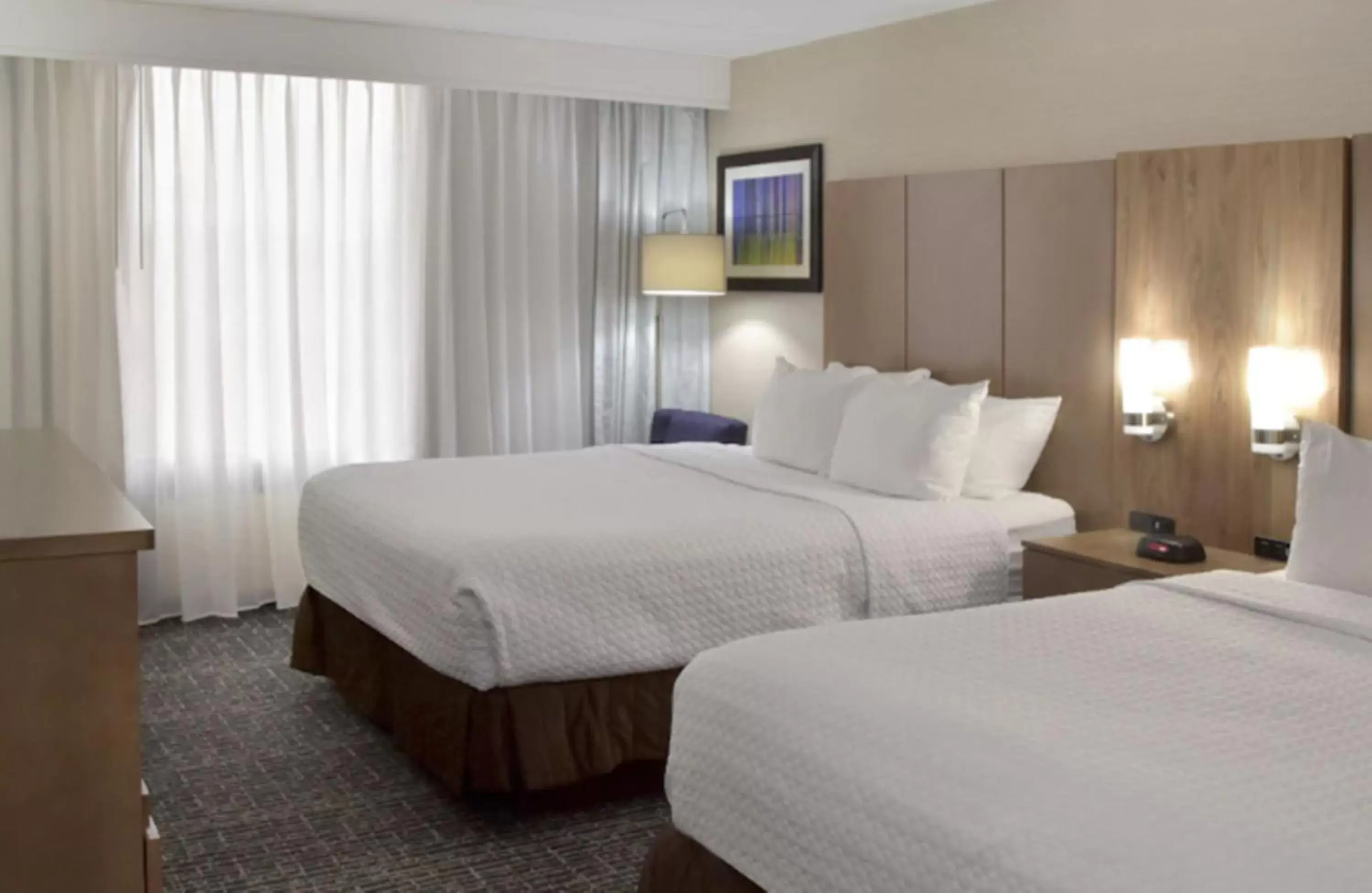 Bed in Crowne Plaza Cleveland Airport, an IHG Hotel
