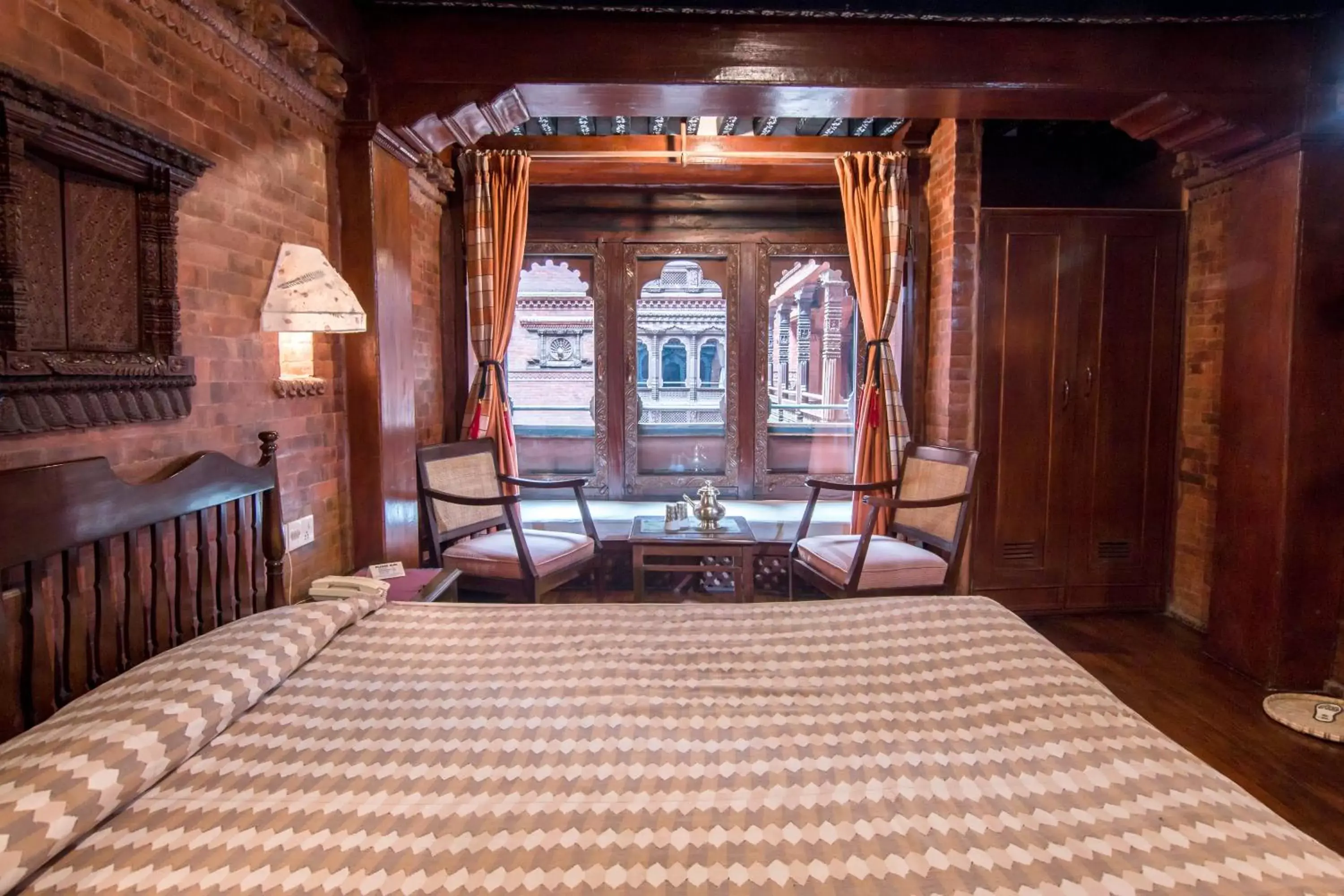 Inner courtyard view, Bed in Kantipur Temple House