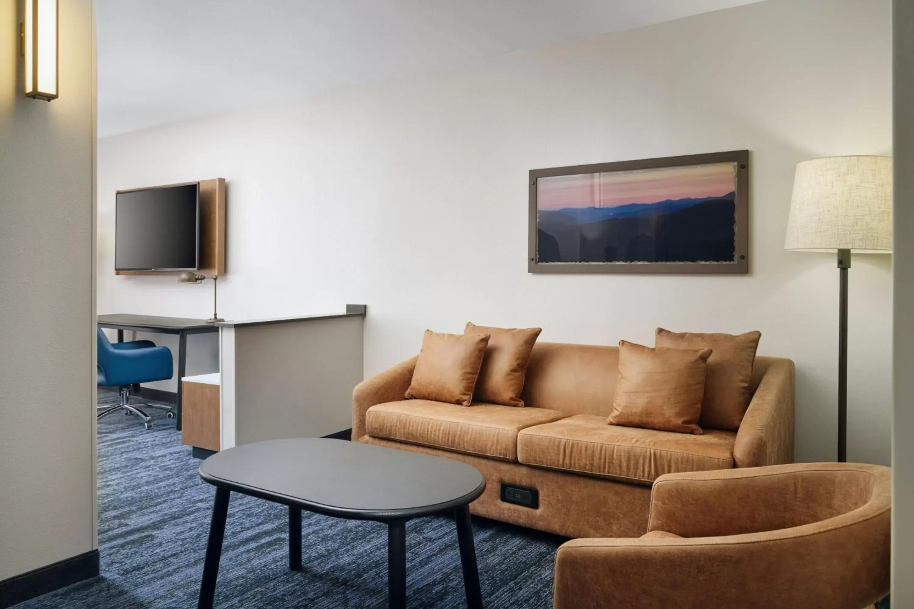 Photo of the whole room, TV/Entertainment Center in Fairfield Inn & Suites Auburn Opelika