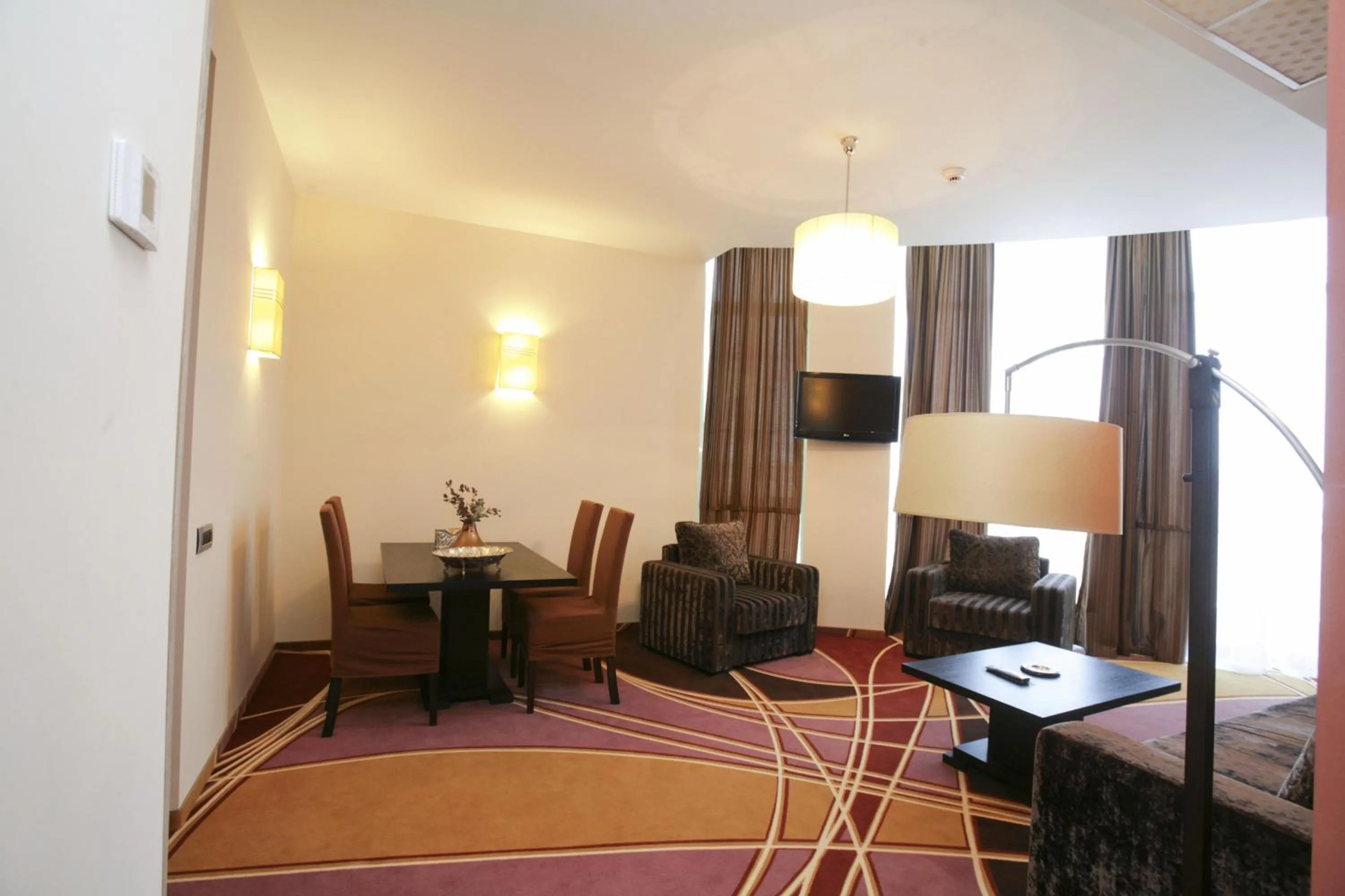 Seating area, Bed in Mari Vila Hotel