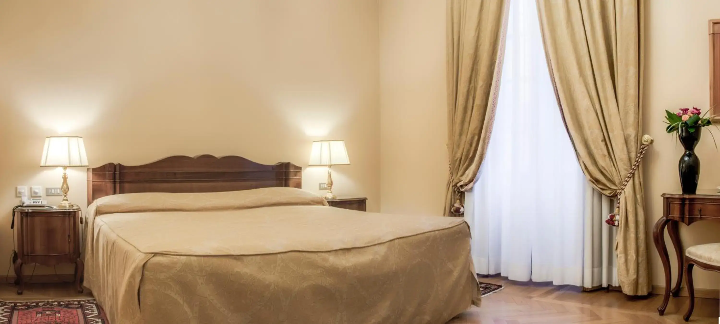 Bed in Villa Fenaroli Palace Hotel