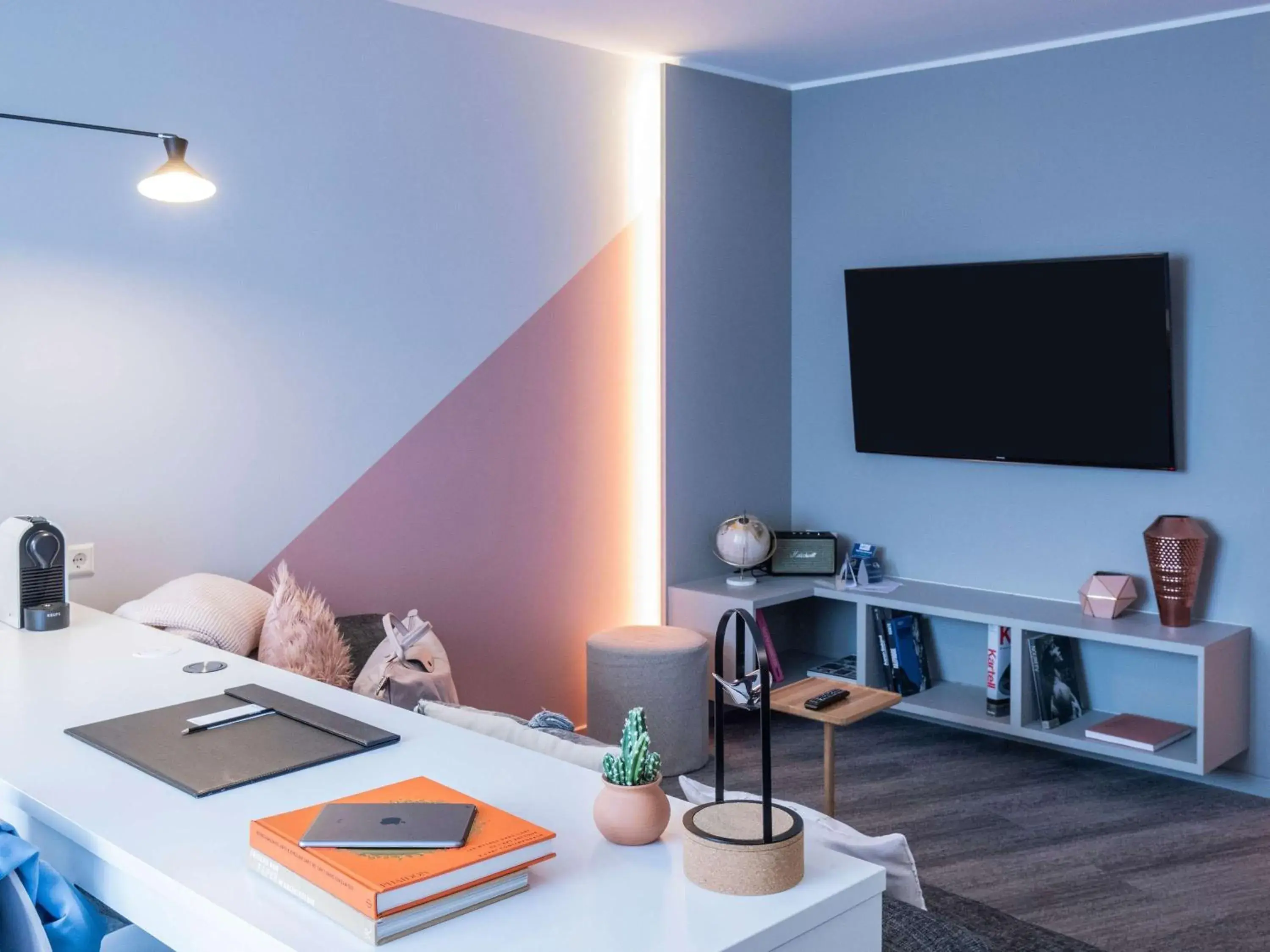 Bedroom, TV/Entertainment Center in Novotel Suites Luxembourg
