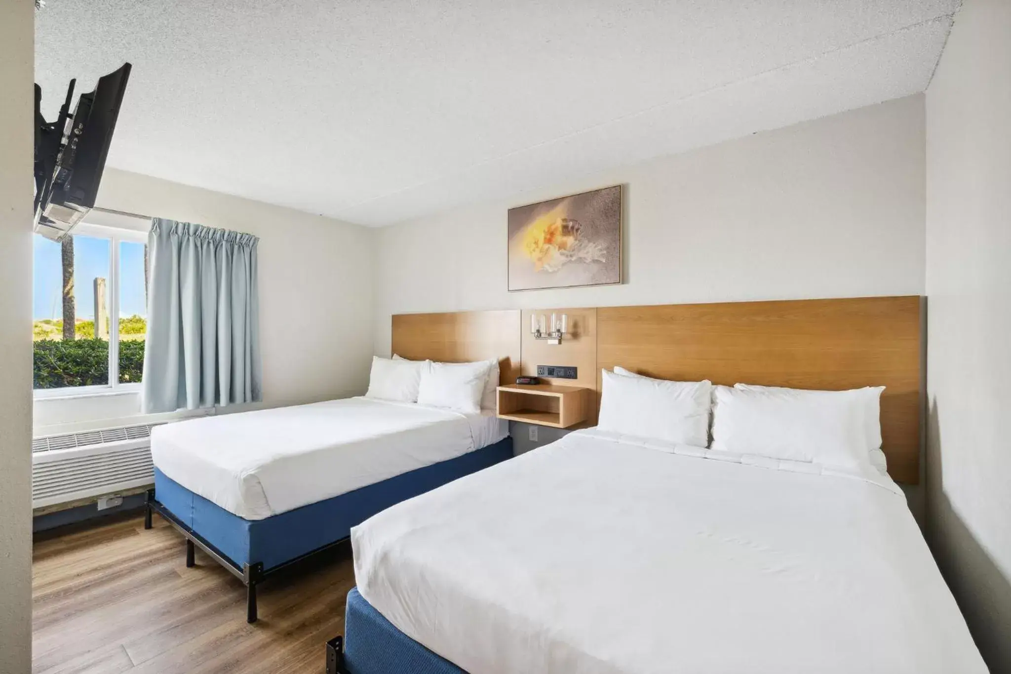 Bedroom, Bed in Sugar Sands Beachfront Hotel, a By The Sea Resort Bedroom, Bed in Sugar Sands Beachfront Hotel, a By The Sea Resort