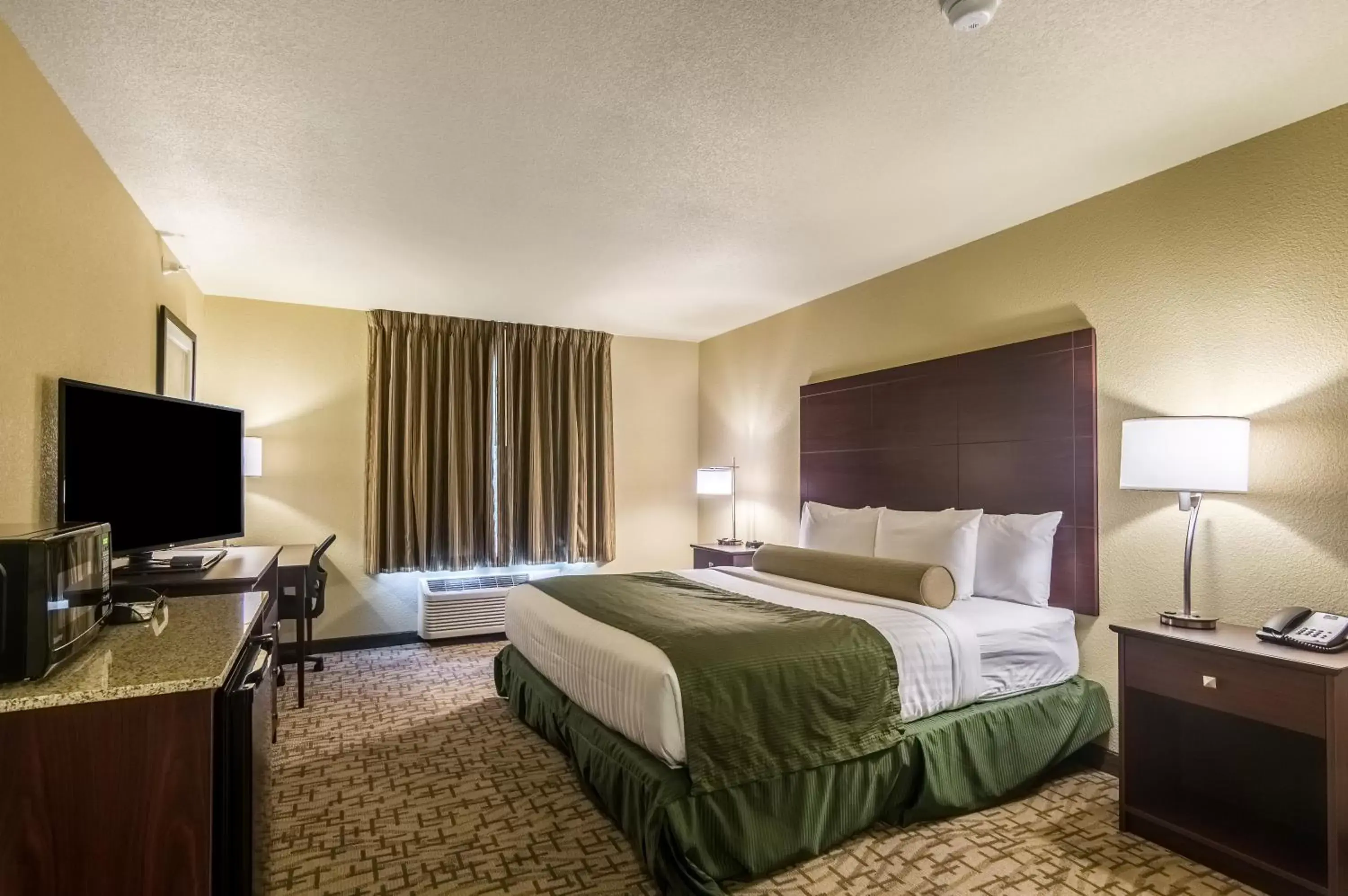 Bed in Cobblestone Inn & Suites - Lakin