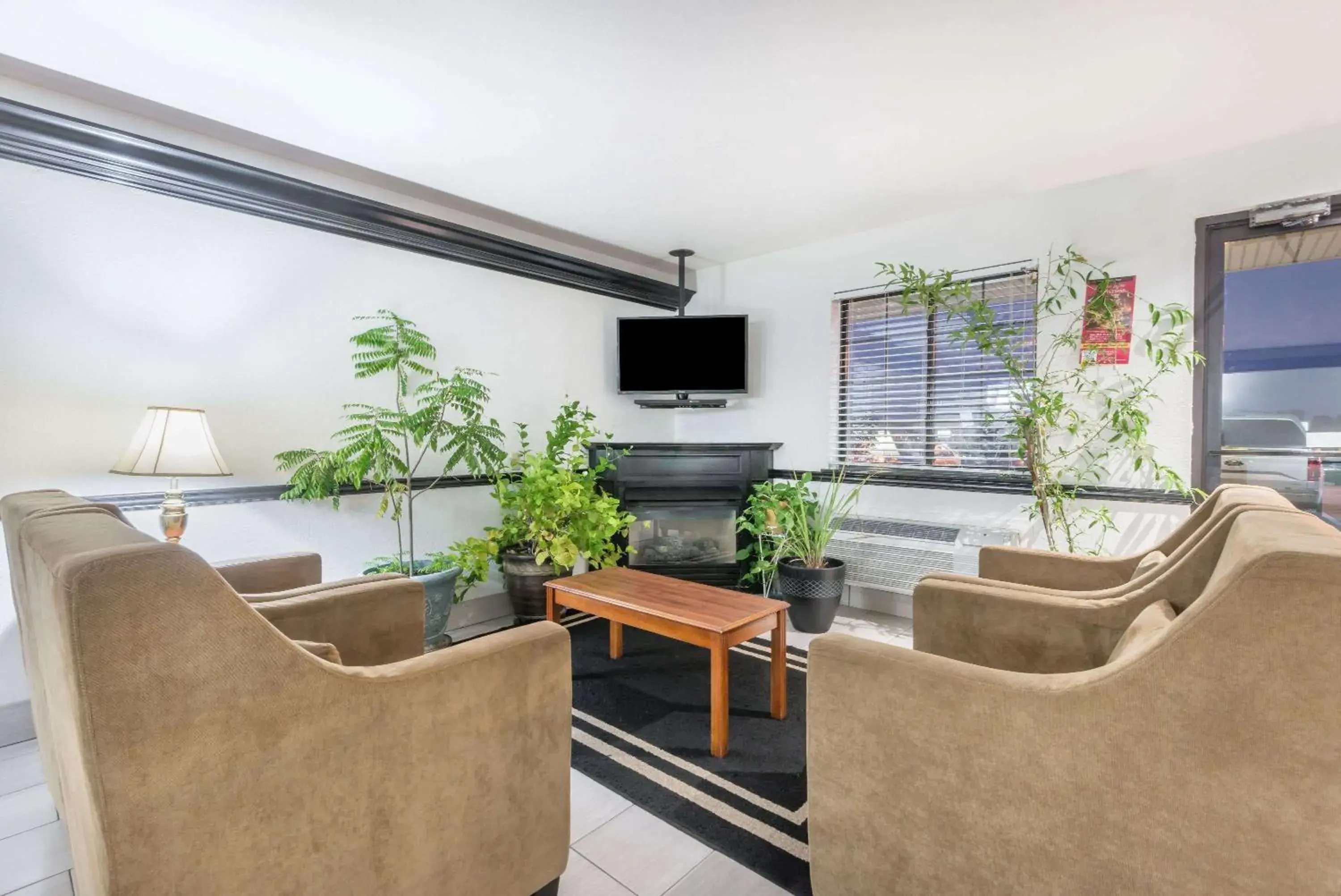 Lobby or reception in Super 8 by Wyndham Madison IN Lobby or reception in Super 8 by Wyndham Madison IN