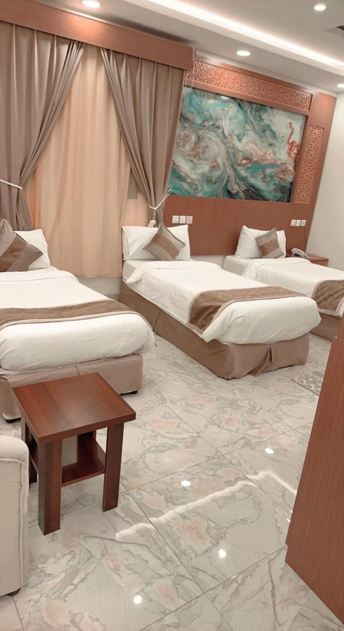 Bed in Taj Aleiman Hotel 