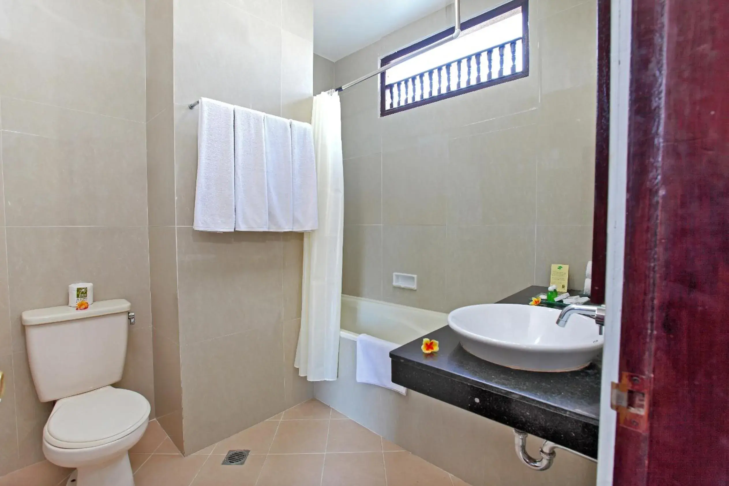 Bathroom in Adi Dharma Hotel Kuta