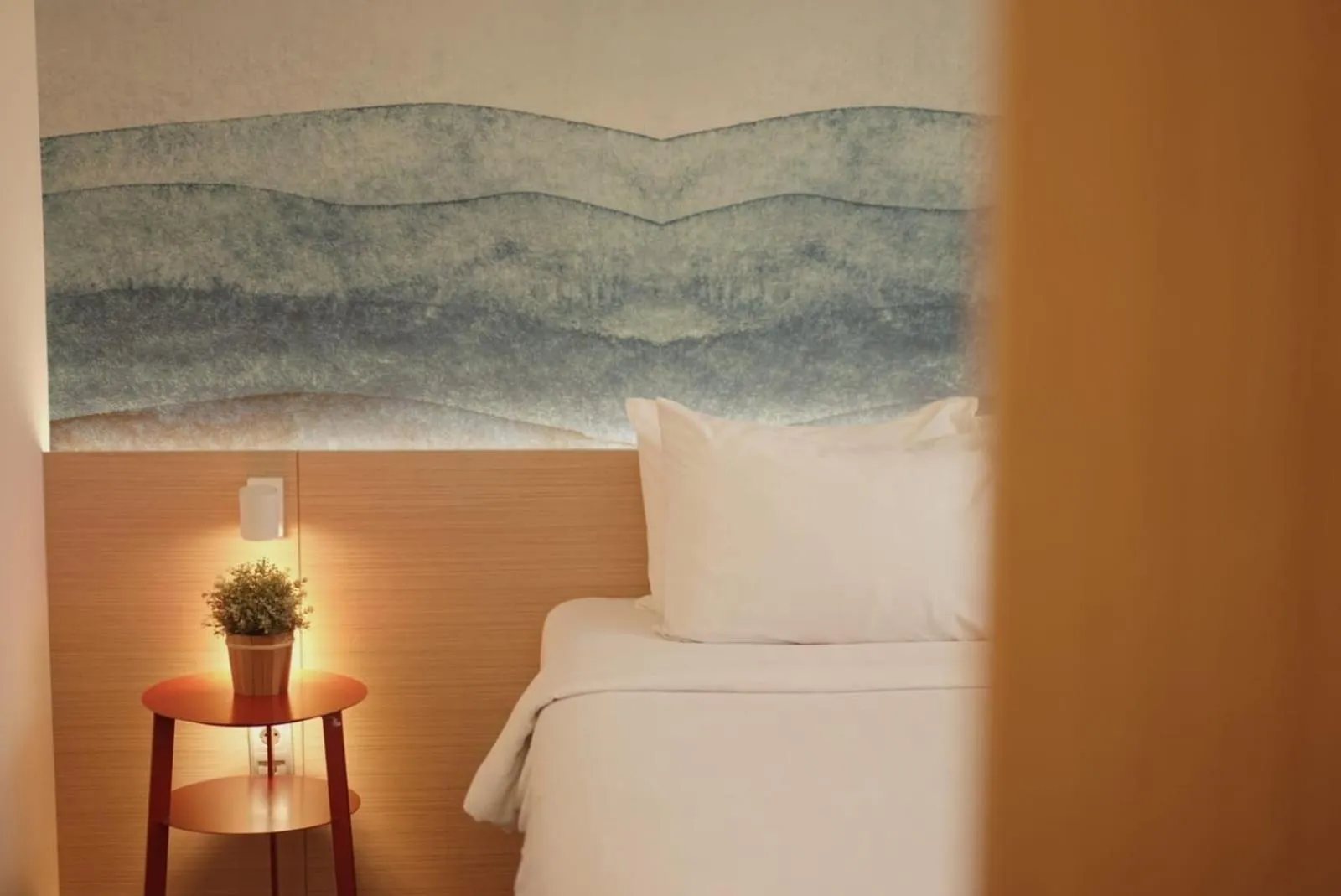 Bed in Malaka Hotel Bandung