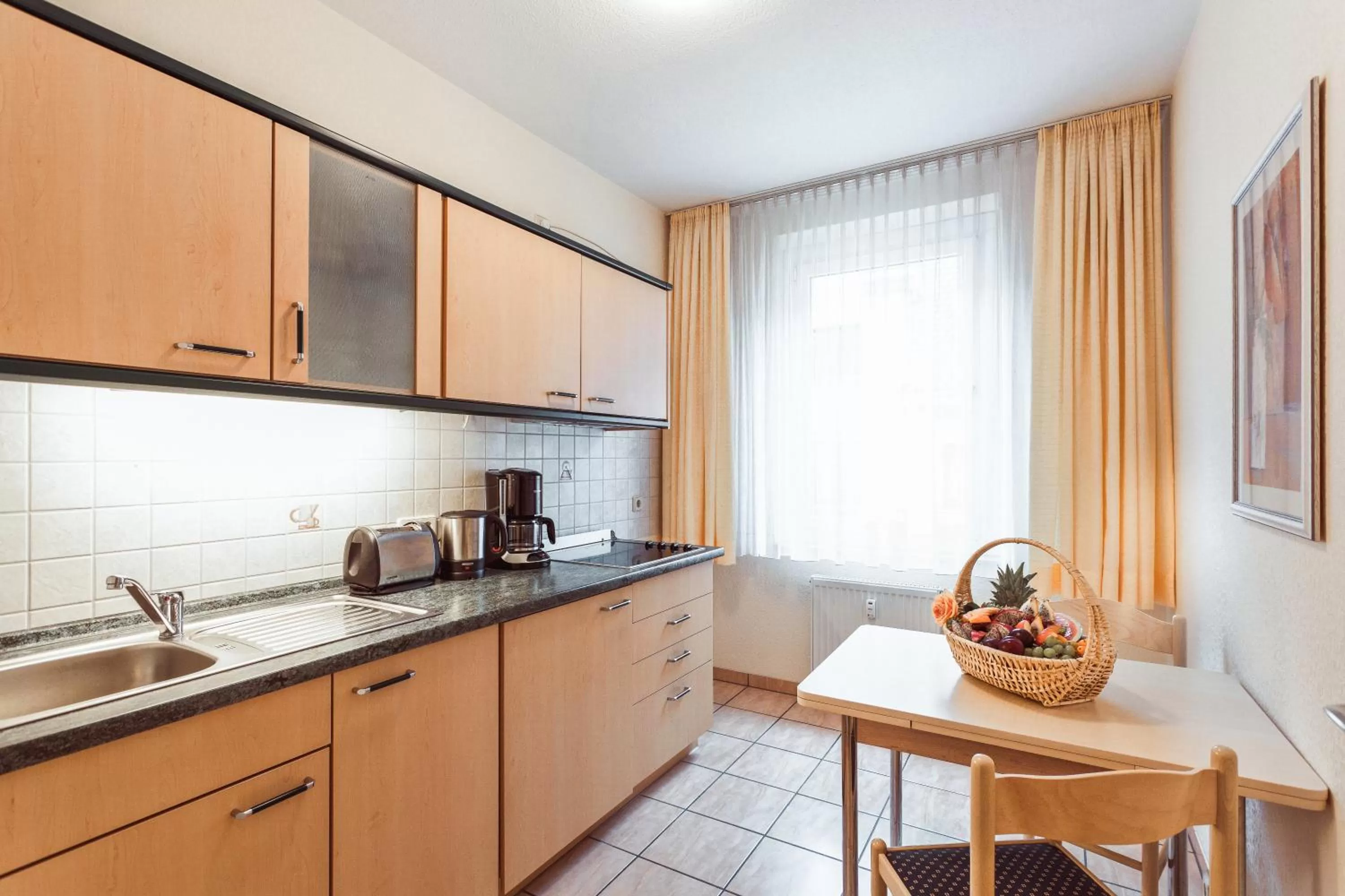 Kitchen or kitchenette in Aparthotel Münzgasse An der Frauenkirche