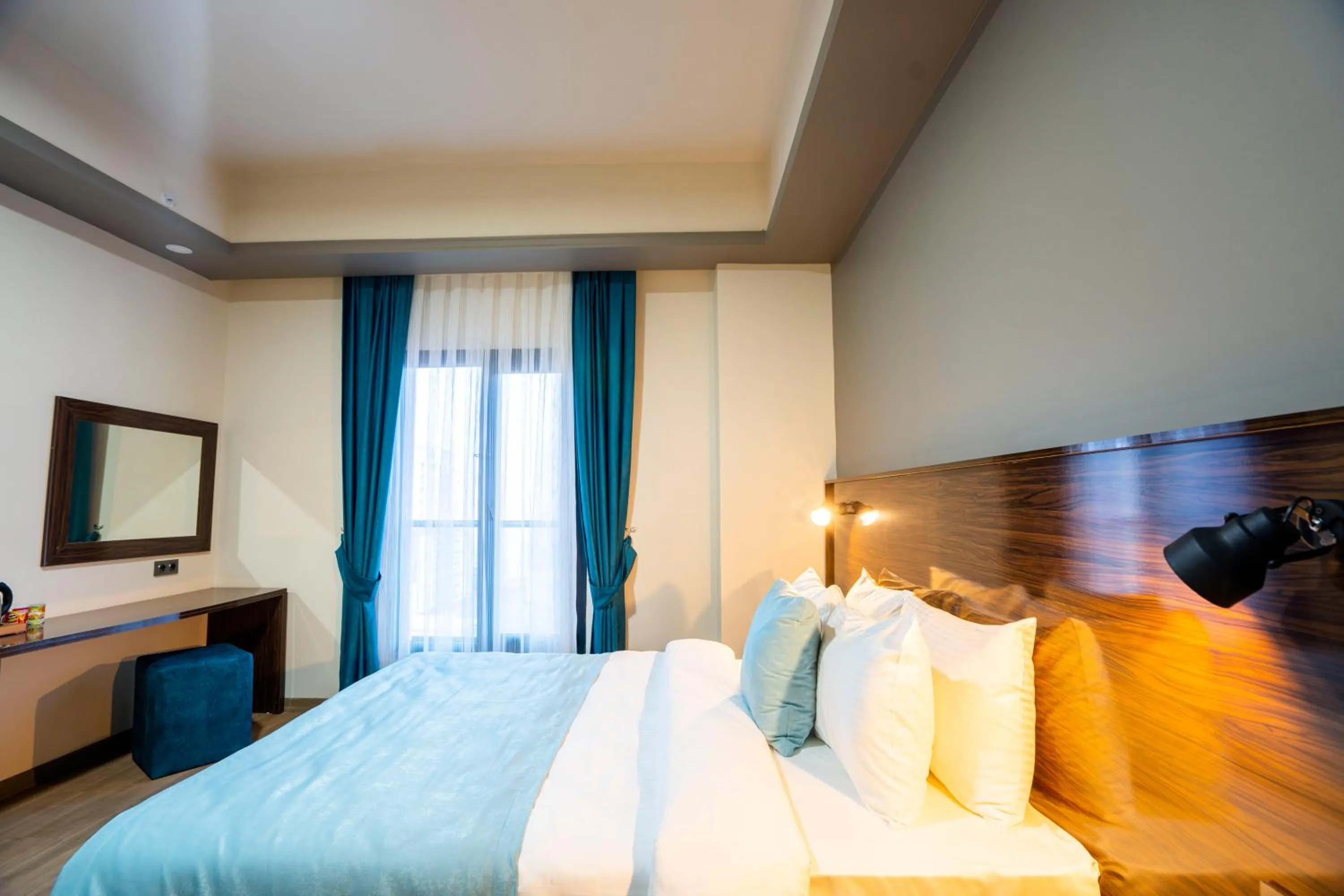 Bed in Mugwort Hotel & Spa