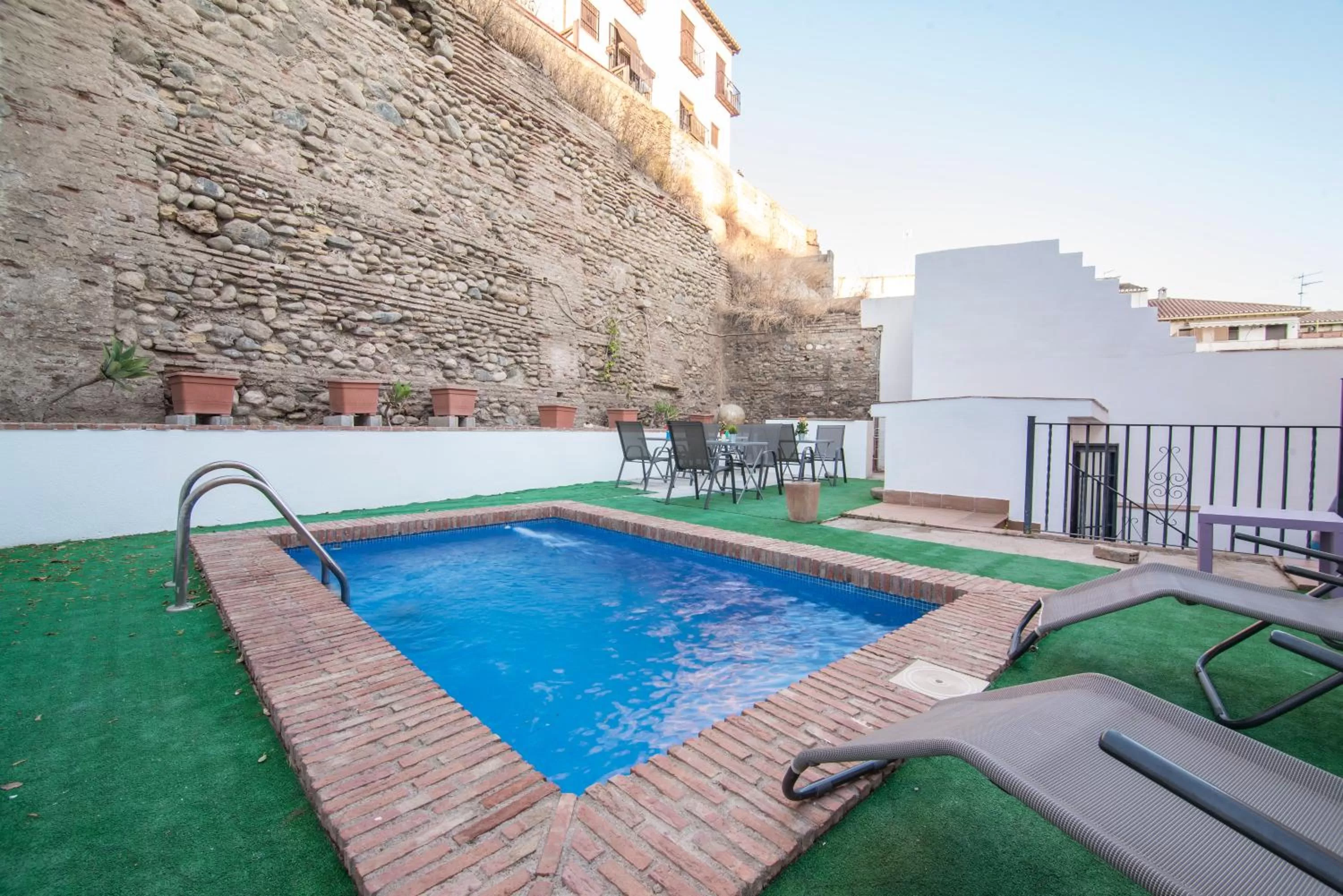 Swimming pool in Apartamentos Granata