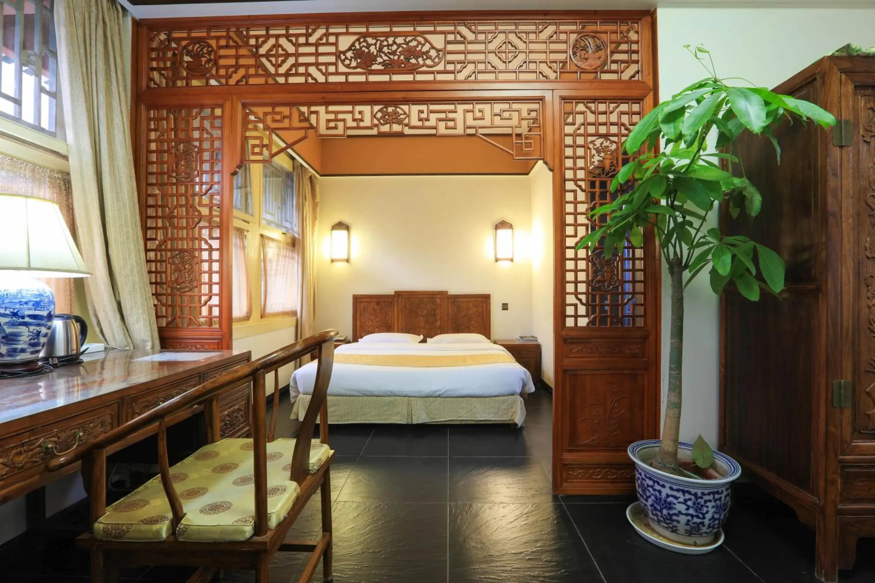 Photo of the whole room, Bed in Beijing Jingyuan Courtyard Hotel