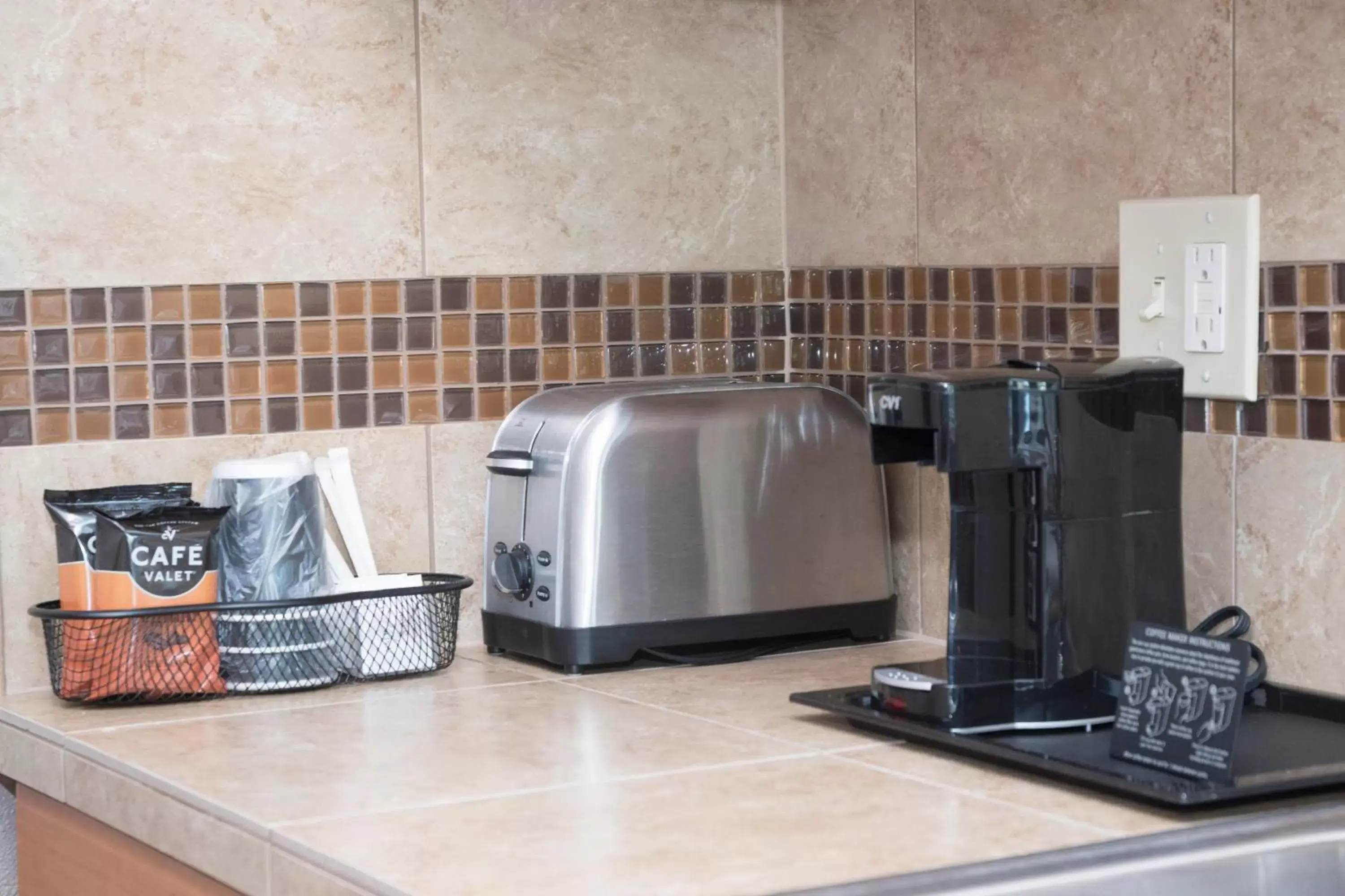 Kitchen/Kitchenette in Nordic Inn and Suites