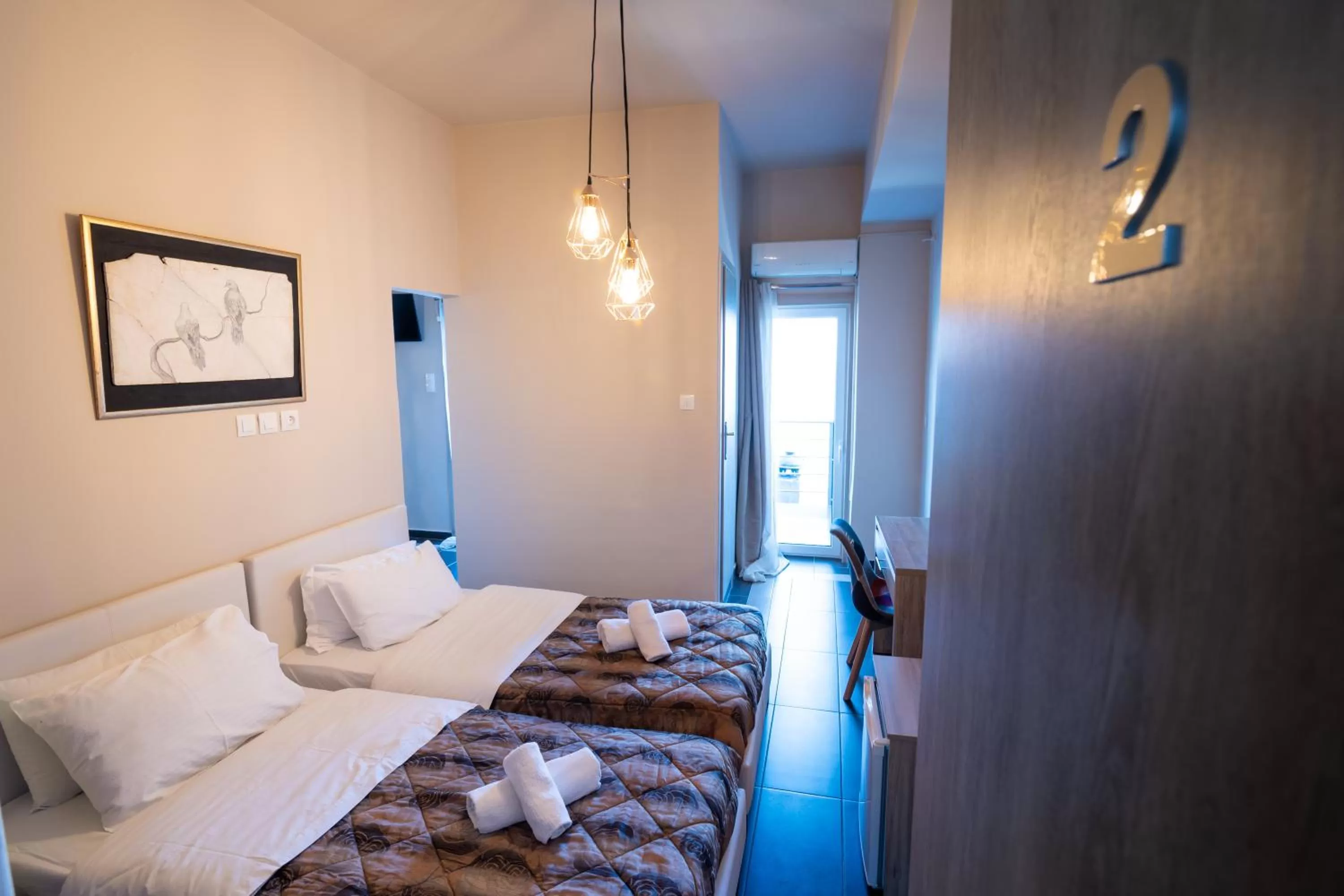 Bed in Votsalakia Hotel & Luxury Apartments