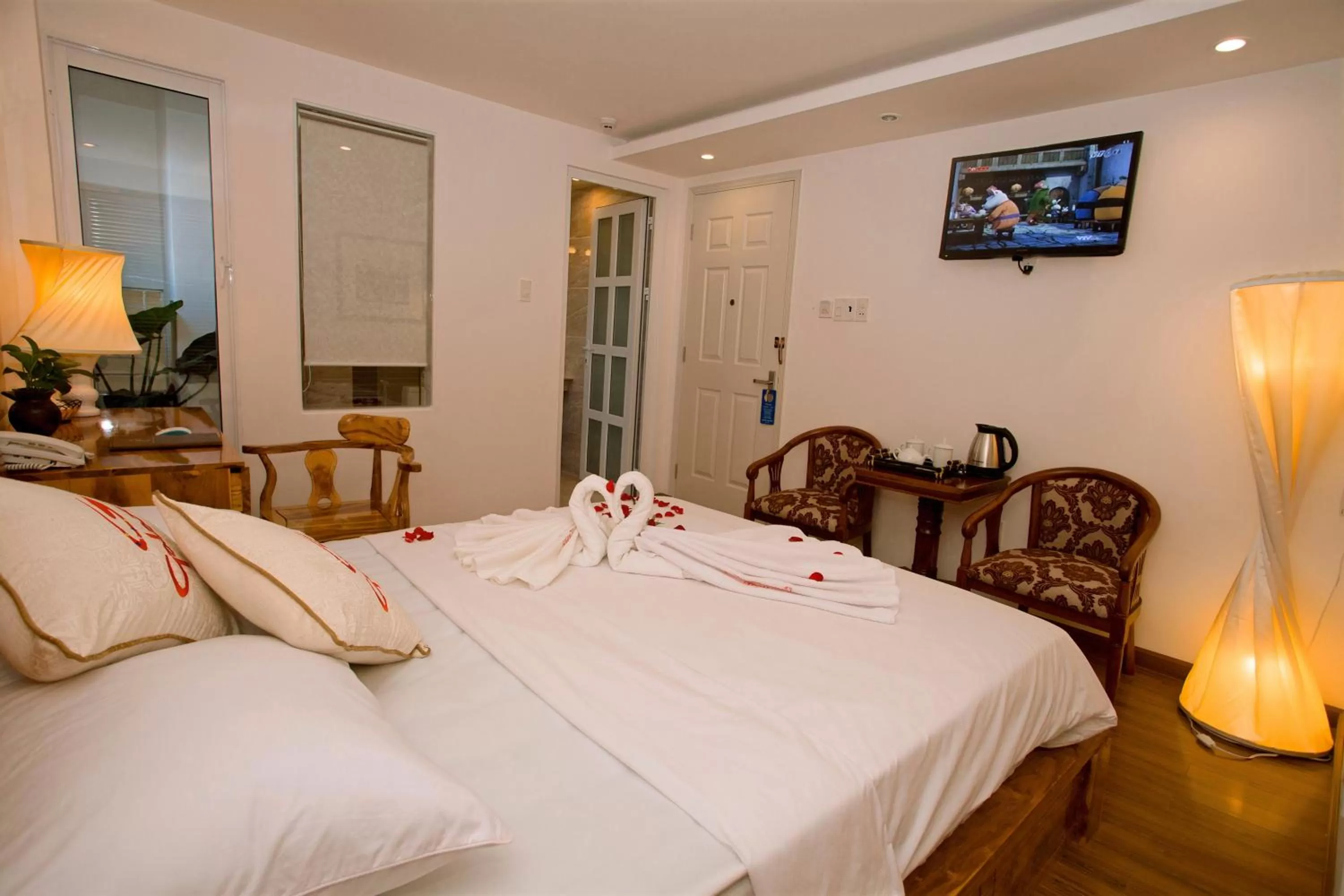 Bed in Rex Hotel & Apartment