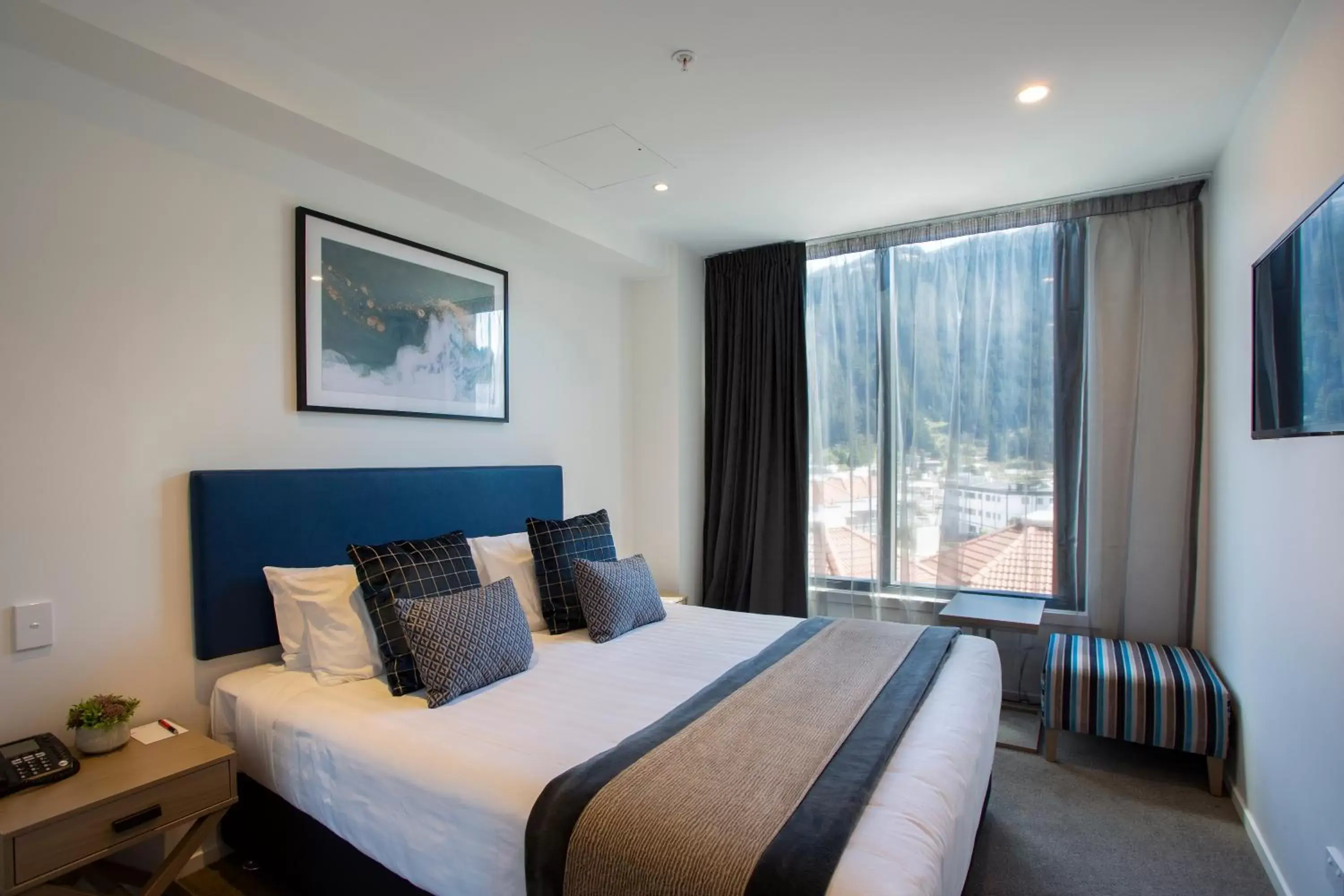 Bed in Ramada Queenstown Central