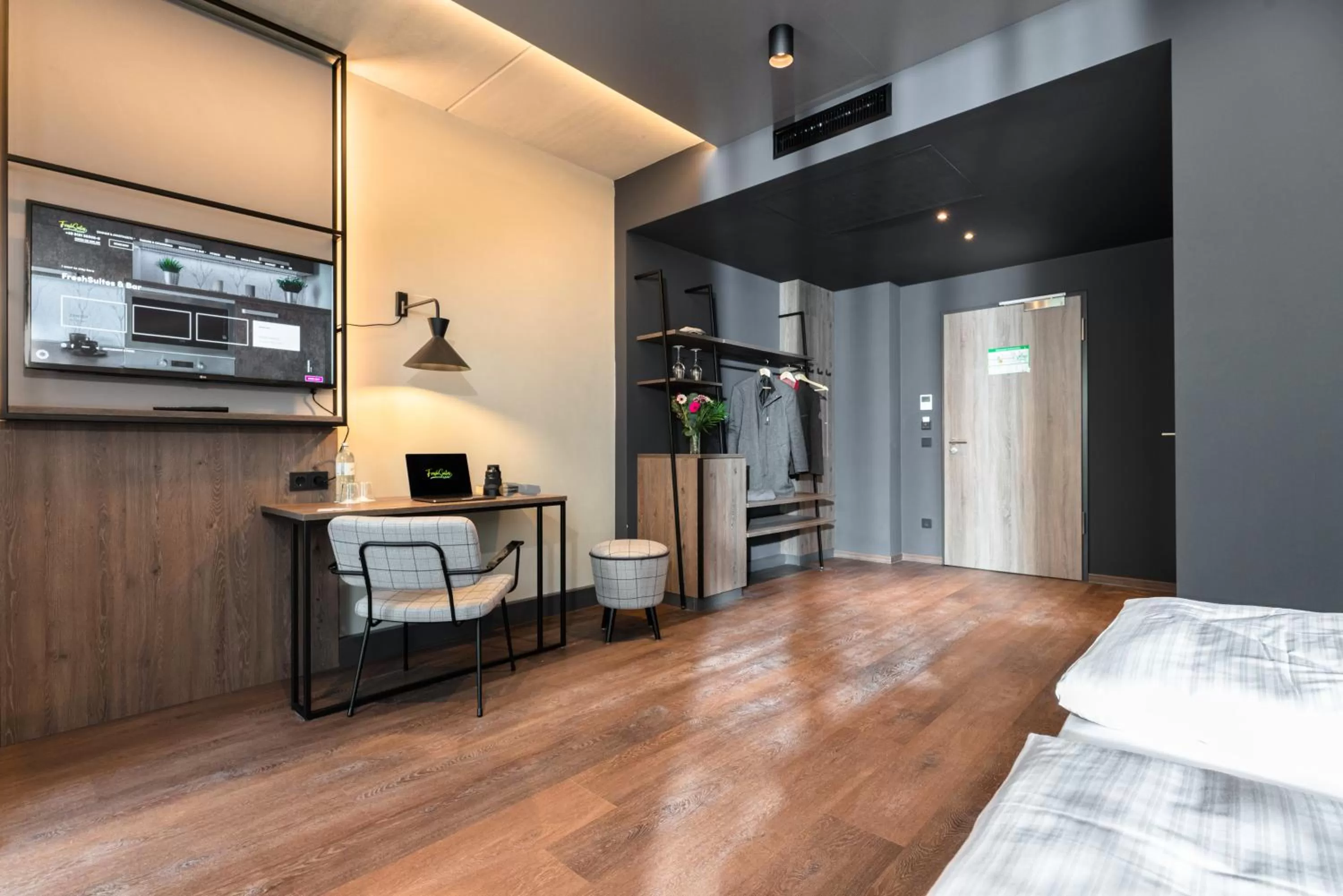 Photo of the whole room, Bed in FreshSuites & Bar