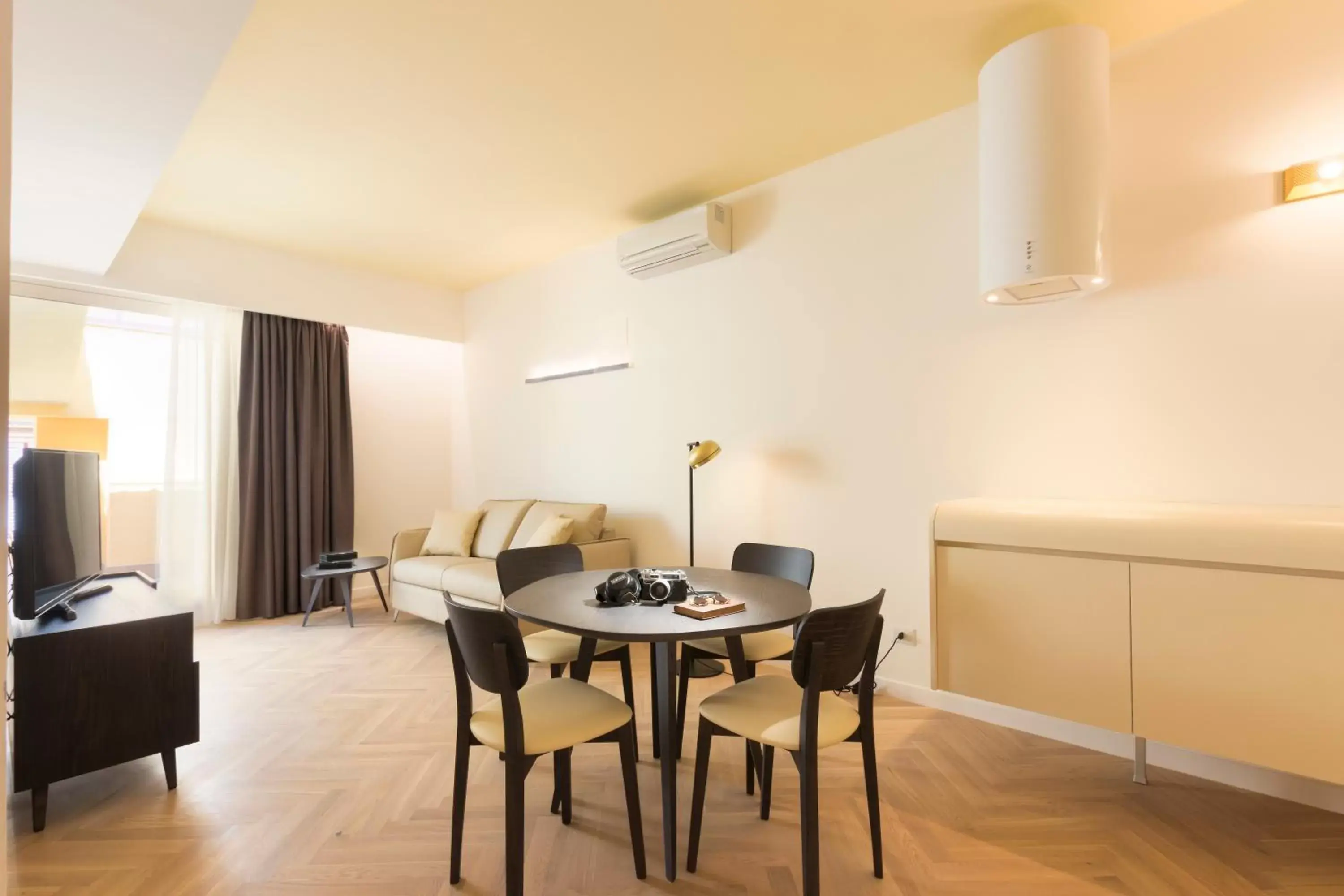 Living room, Dining Area in Metropolitan Suites