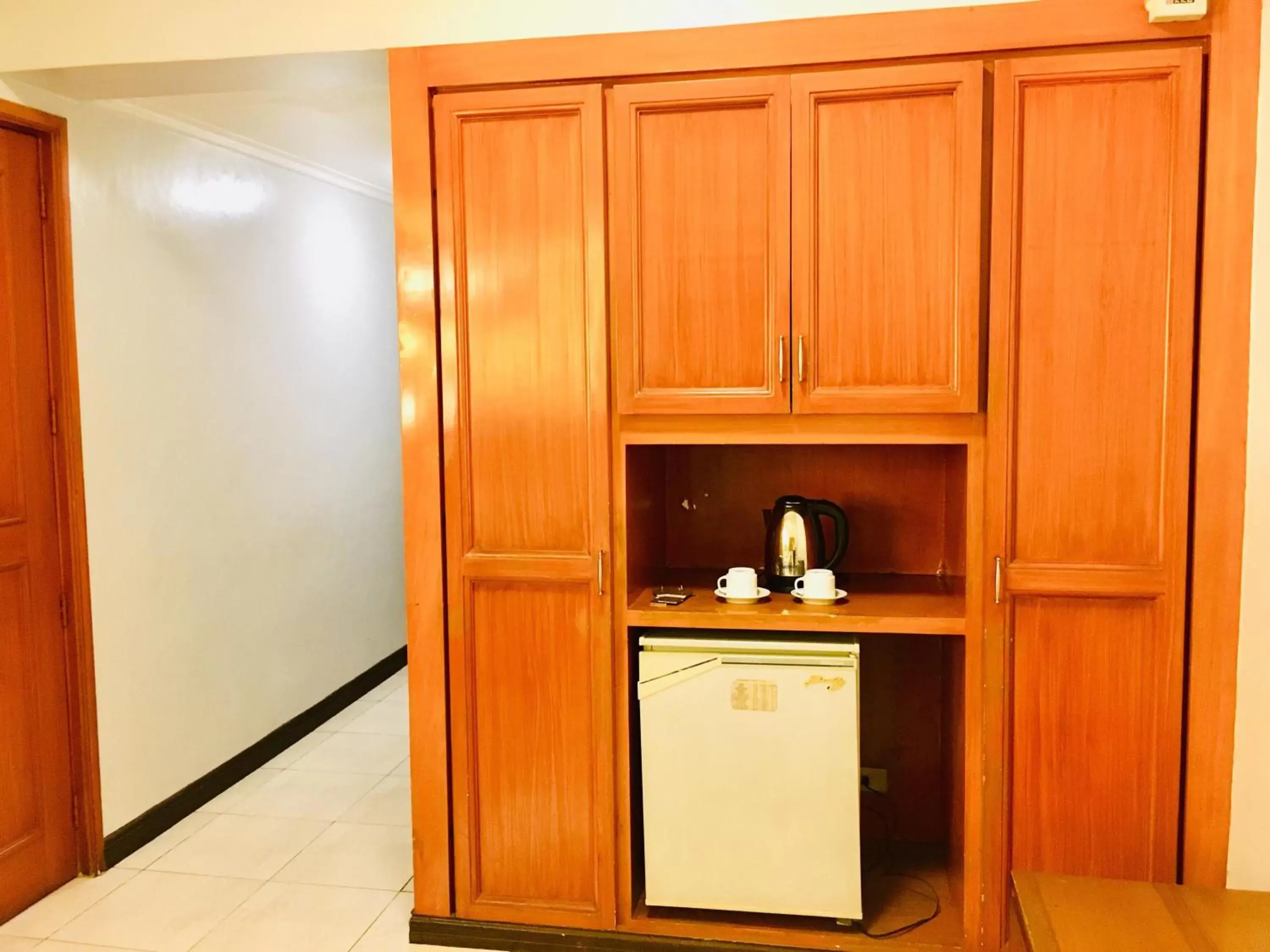 Kitchen/Kitchenette in Jupiter Suites