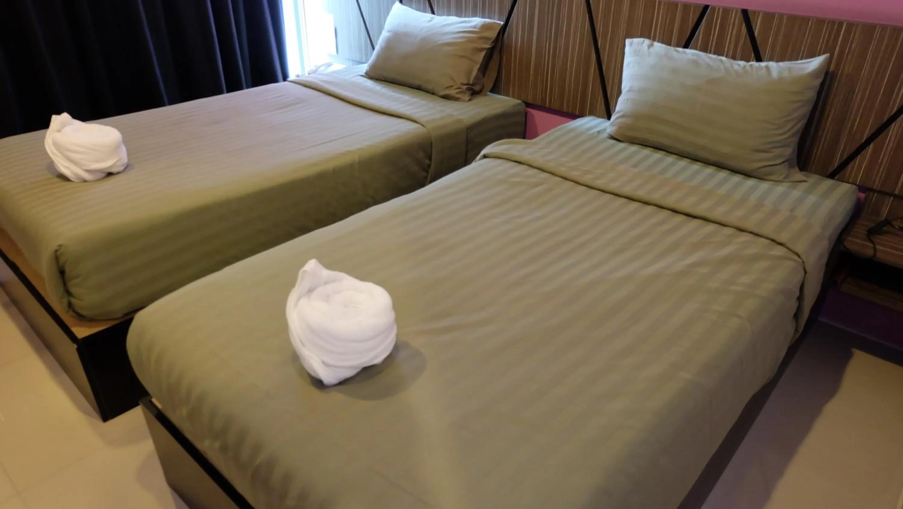Bed in AIRY Suvarnabhumi Hotel