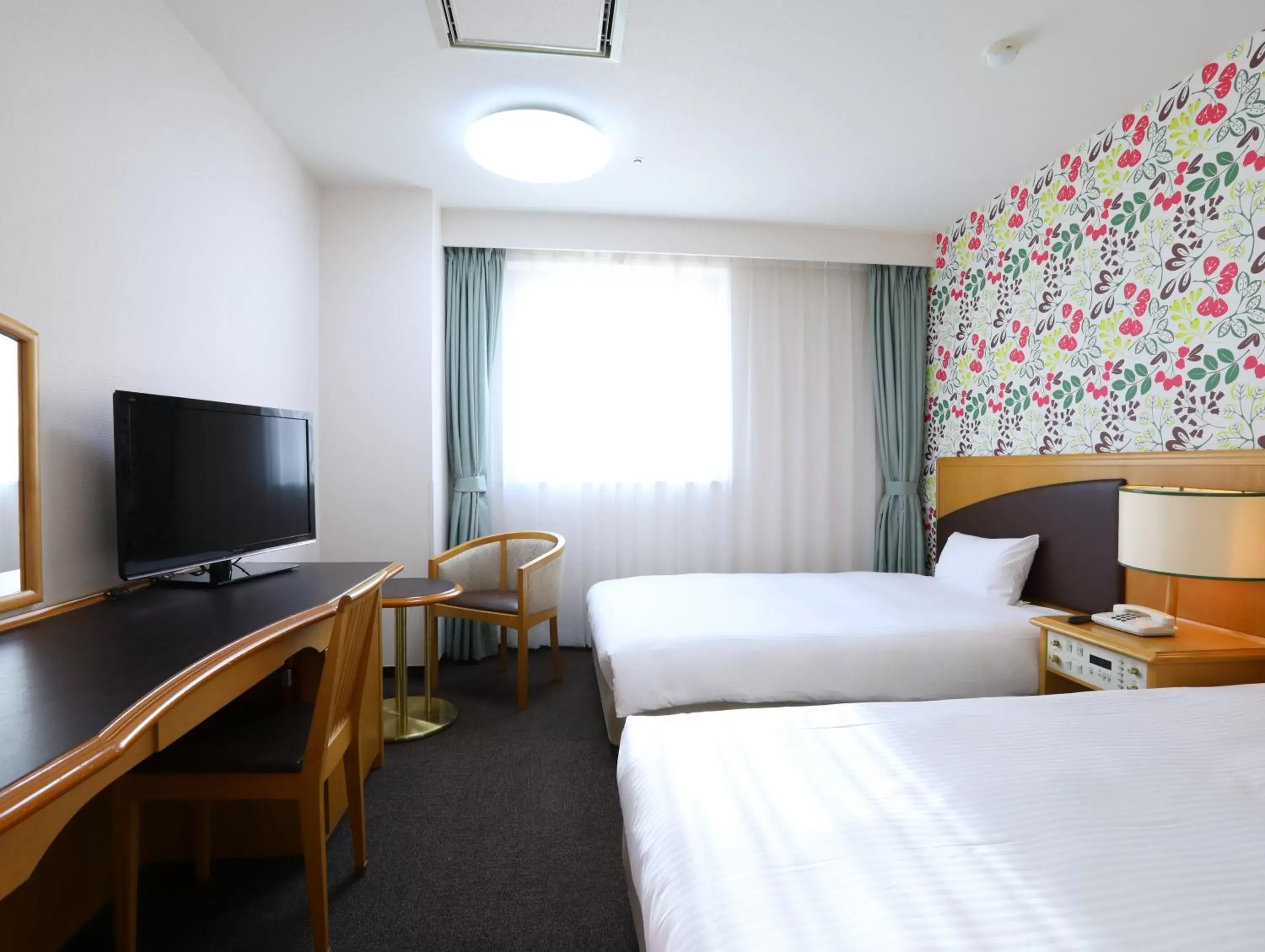 Bed in Hotel Wing International Tomakomai