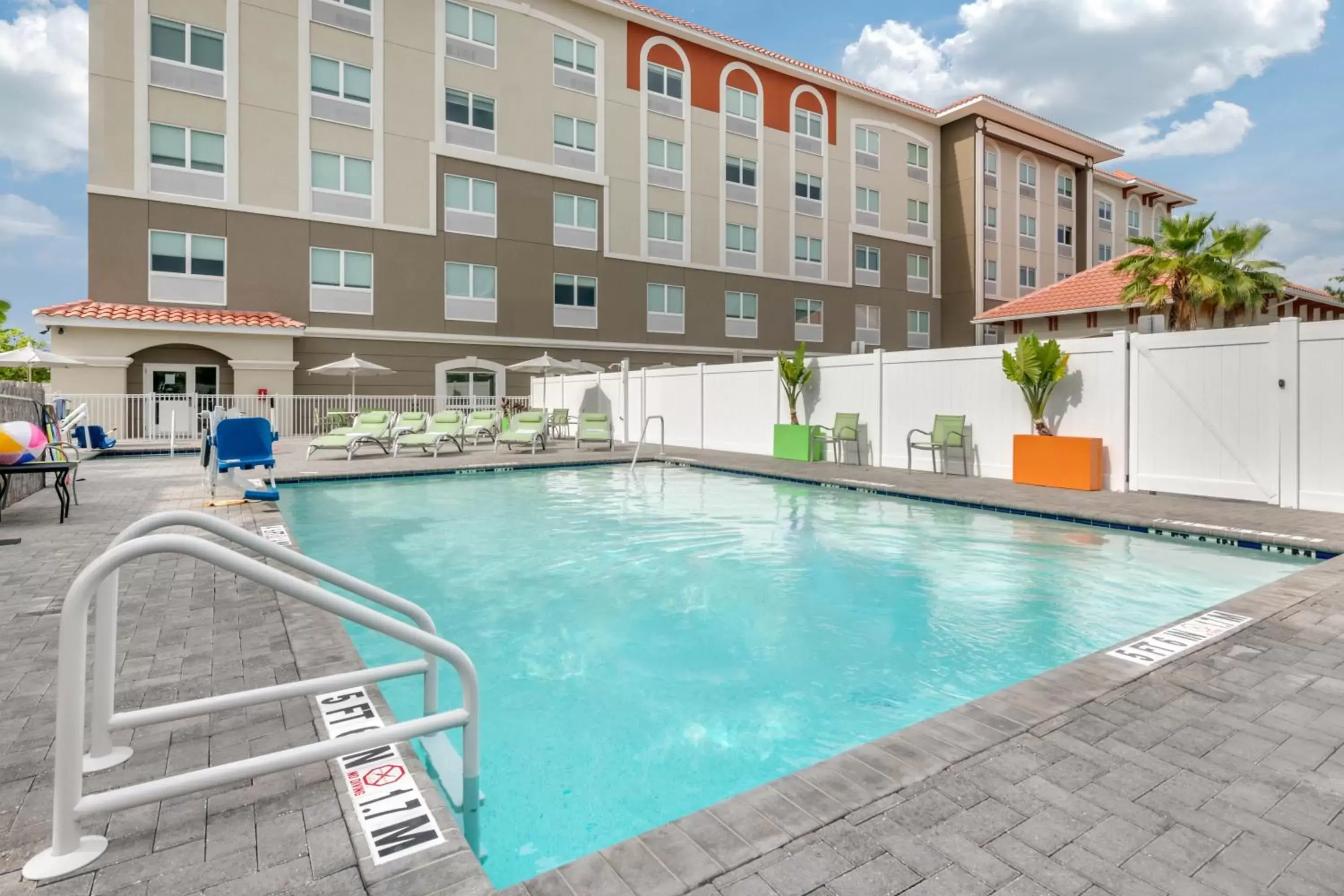 Swimming pool in Holiday Inn Express & Suites - St. Petersburg - Madeira Beach, an IHG Hotel