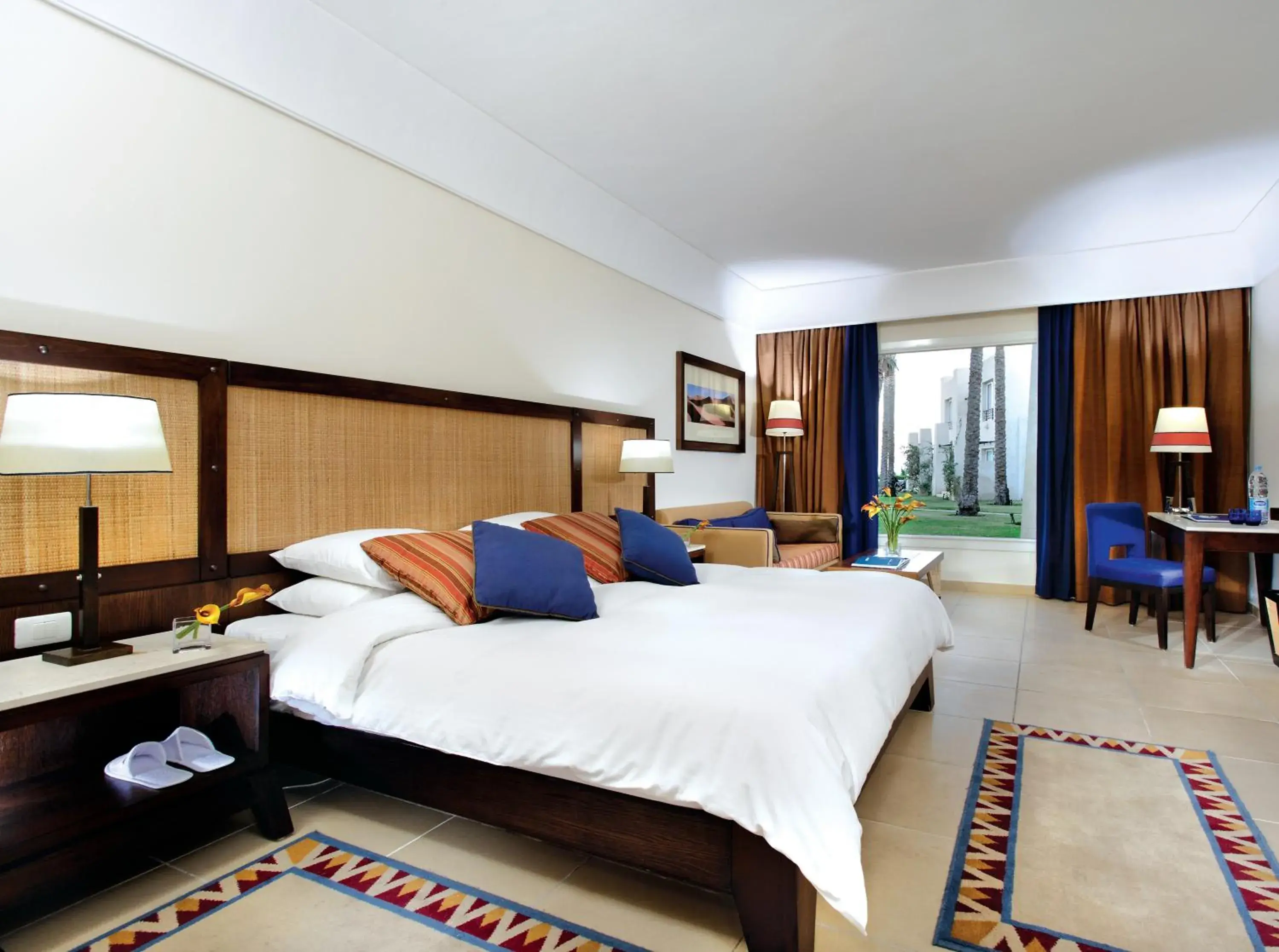 Bed in Grand Rotana Resort & Spa