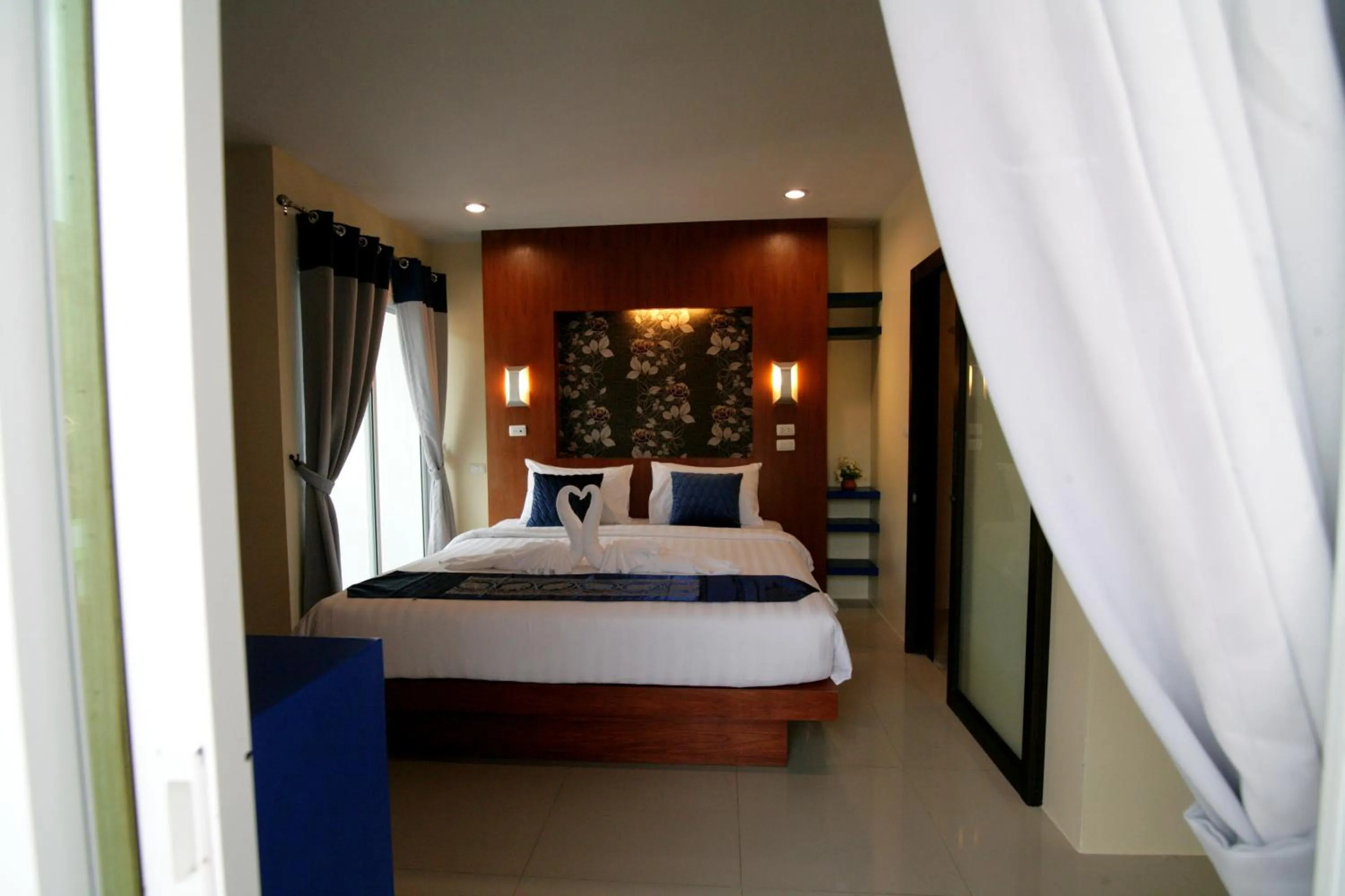 Bed in Calypso Patong Hotel