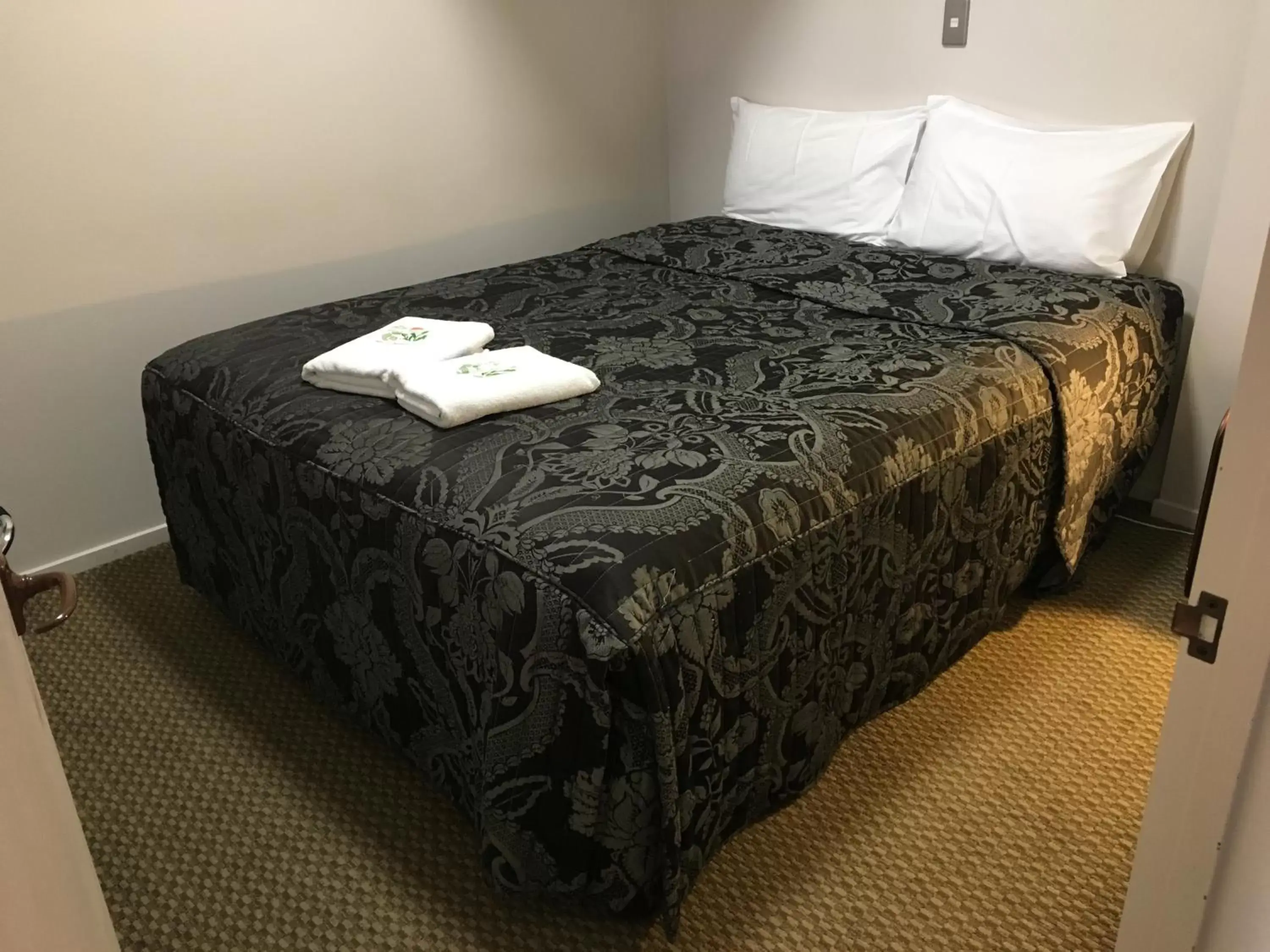 Bed in Motel on Carroll