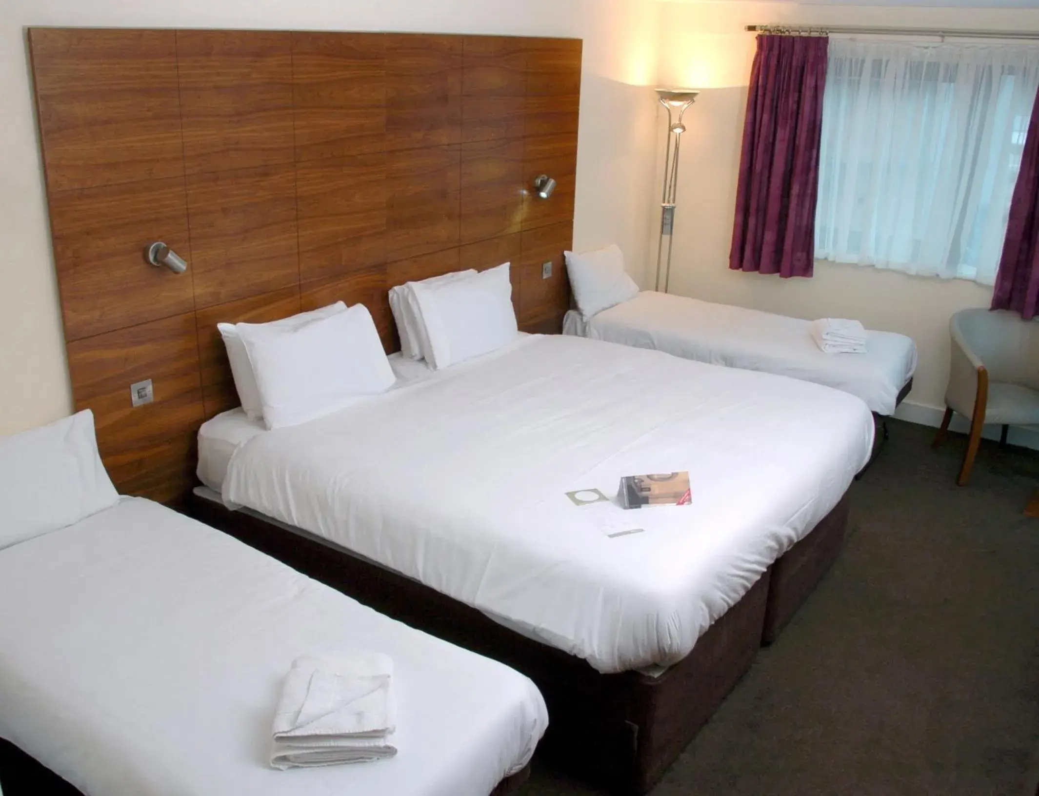 Bed in Legacy Preston International Hotel