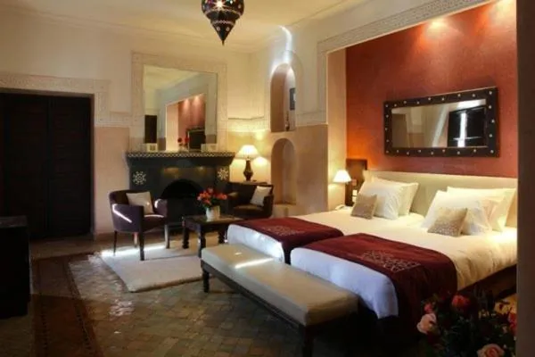 Photo of the whole room, Bed in Riad Monceau