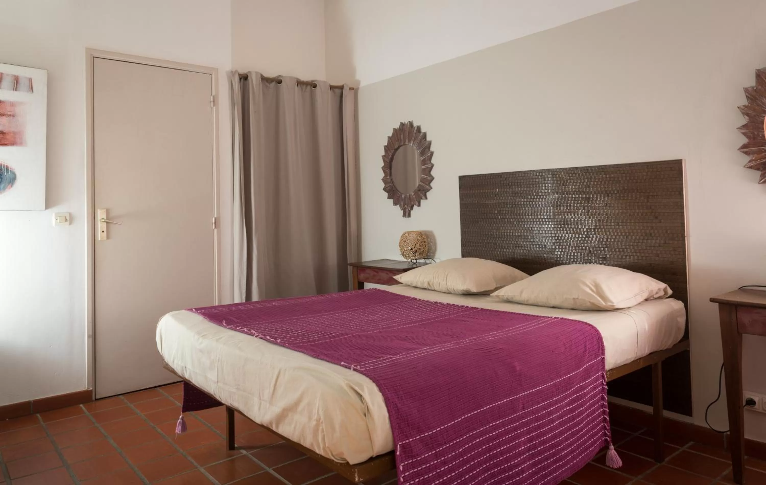 Bed in Hôtel Les Bananiers